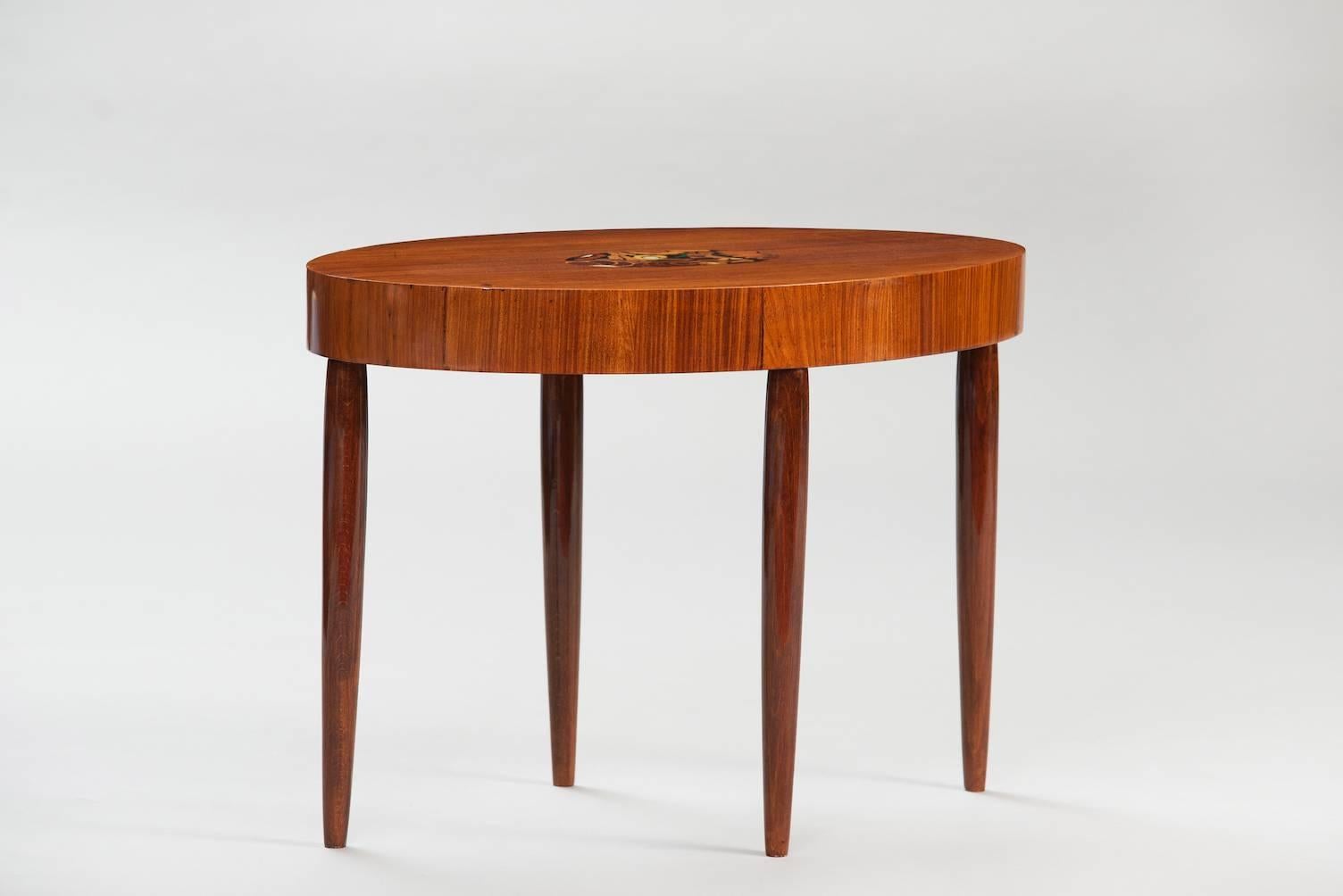 Rosewood oval side table with exotic woods and mother-of-pearl inlaid, in the style of Louis Majorelle.