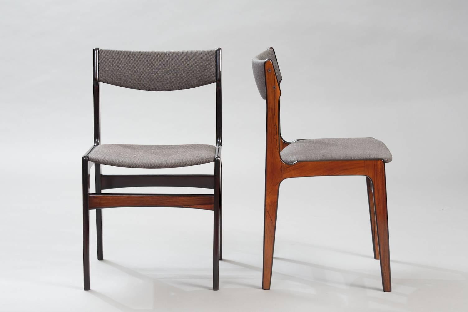 Set of rosewood dining chairs re-upholstered in grey fabric.
Eight units available.