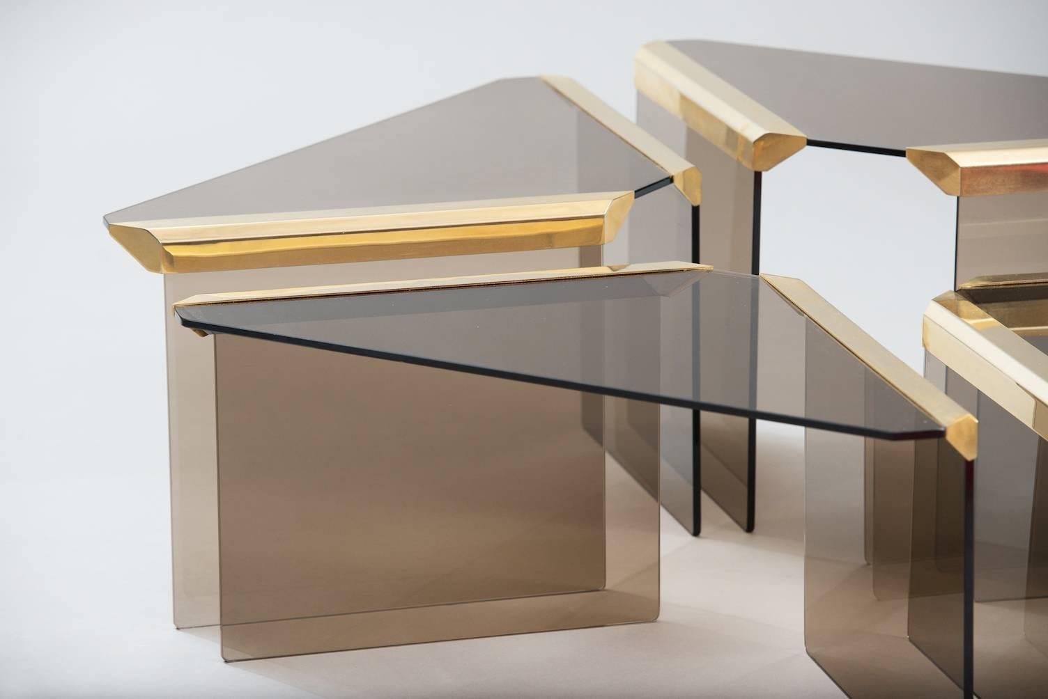 Set of four smoked glass and brass nesting tables.
Producer: Gallotti & Radice.
The measures are for the biggest table.