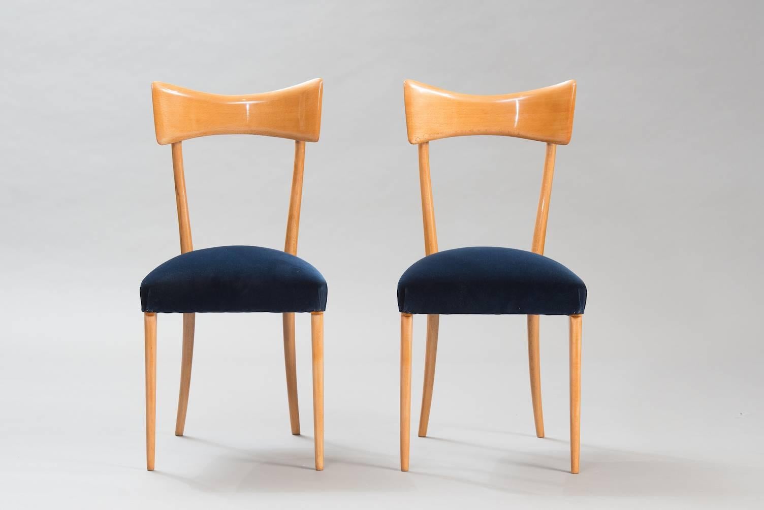 Set of six beech high back dining chairs in the style of Ico Parisi reupholstered in dark blue velvet.