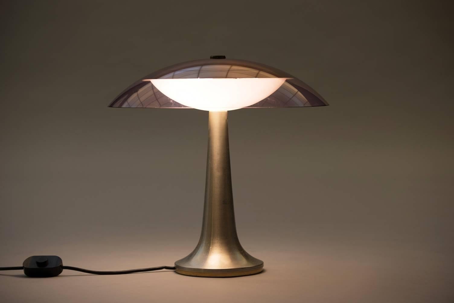 Aluminium and plexiglass table lamp.