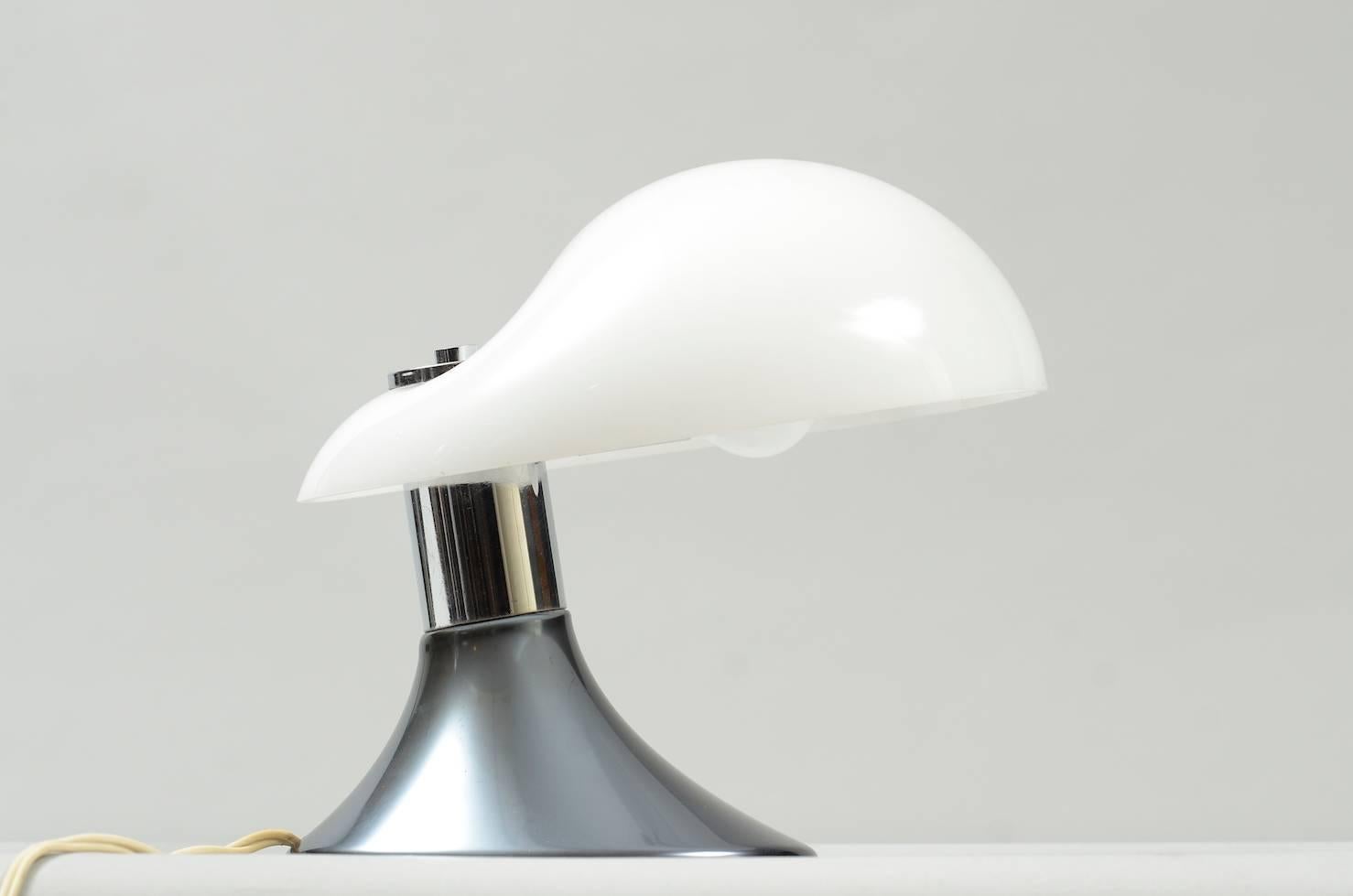 Chrome and white acrylic table lamp.
