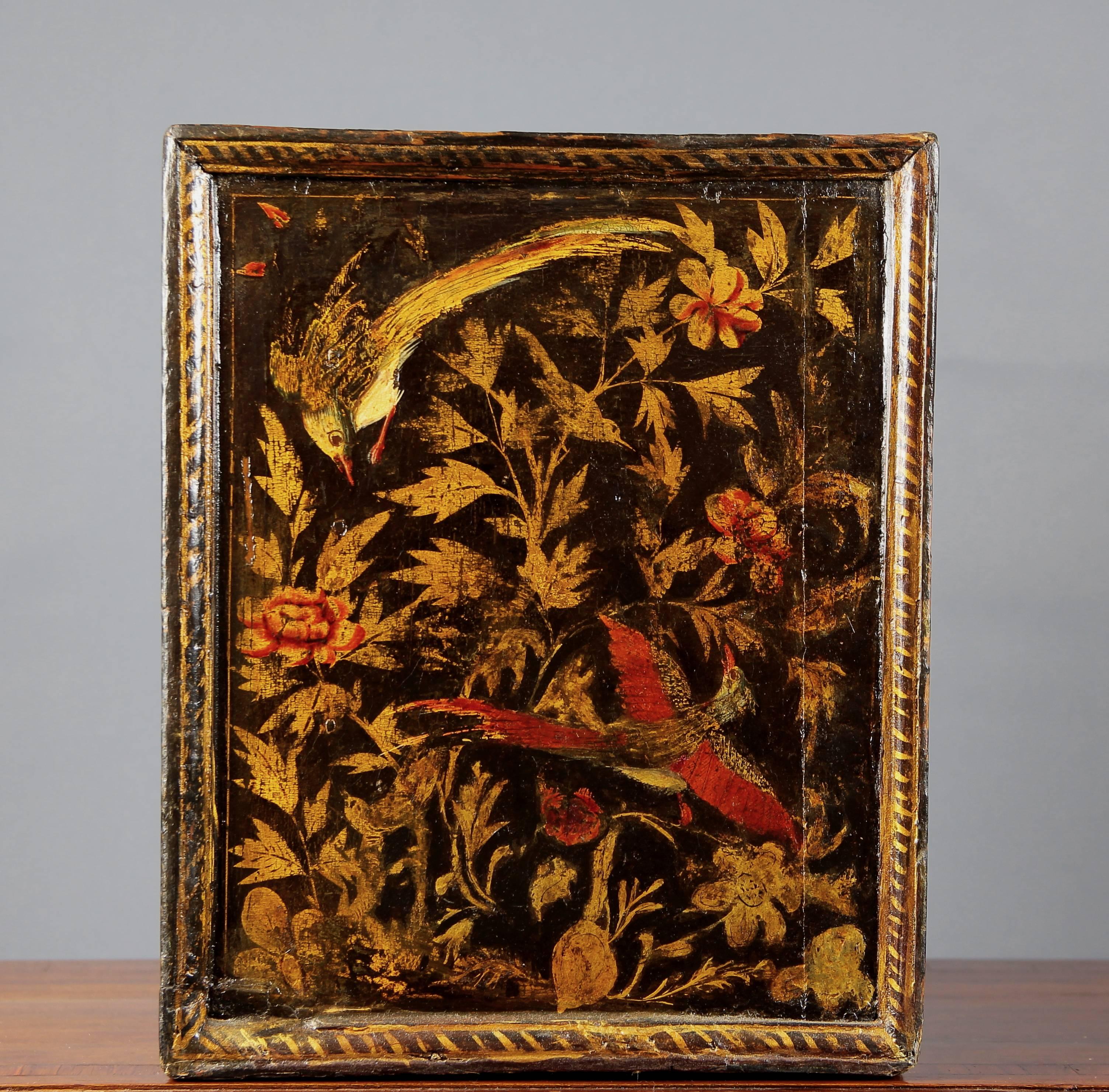 16th-17th century Portuguese commissioned oriental lacquered table cabinet.
Sinde.
Box with ten different sized drawers. Decorated with birds and floral elements. Lacquered and painted,
Pakistan, 16th-17th century.
 