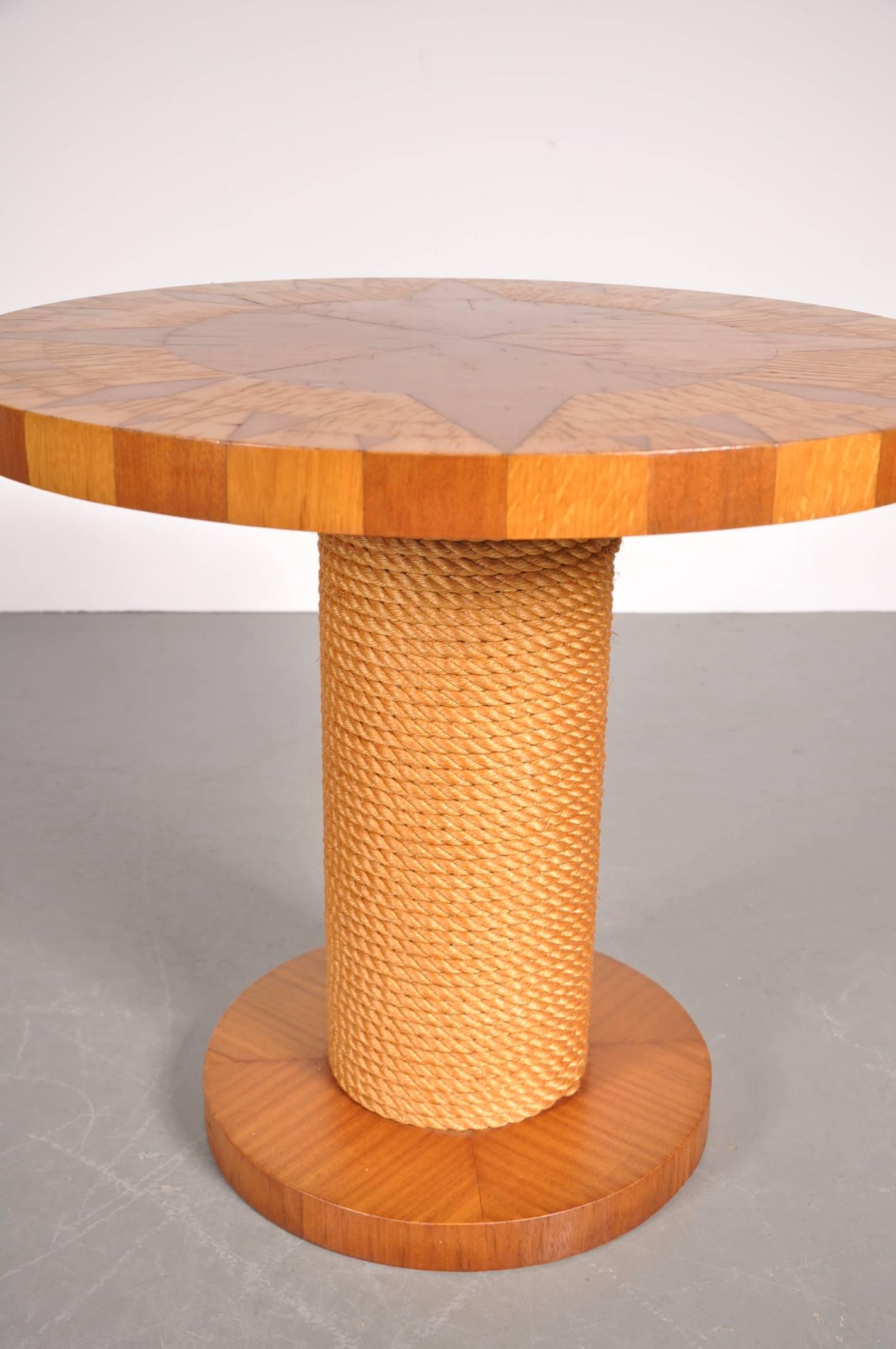 Unique side table in the style of Adrien Audoux and Frida Minet, manufactured in France around 1960.

This unique piece is made of beautiful quality wood. The base is surrounded by rope, in the style of the French designer couple Audoux and Frida