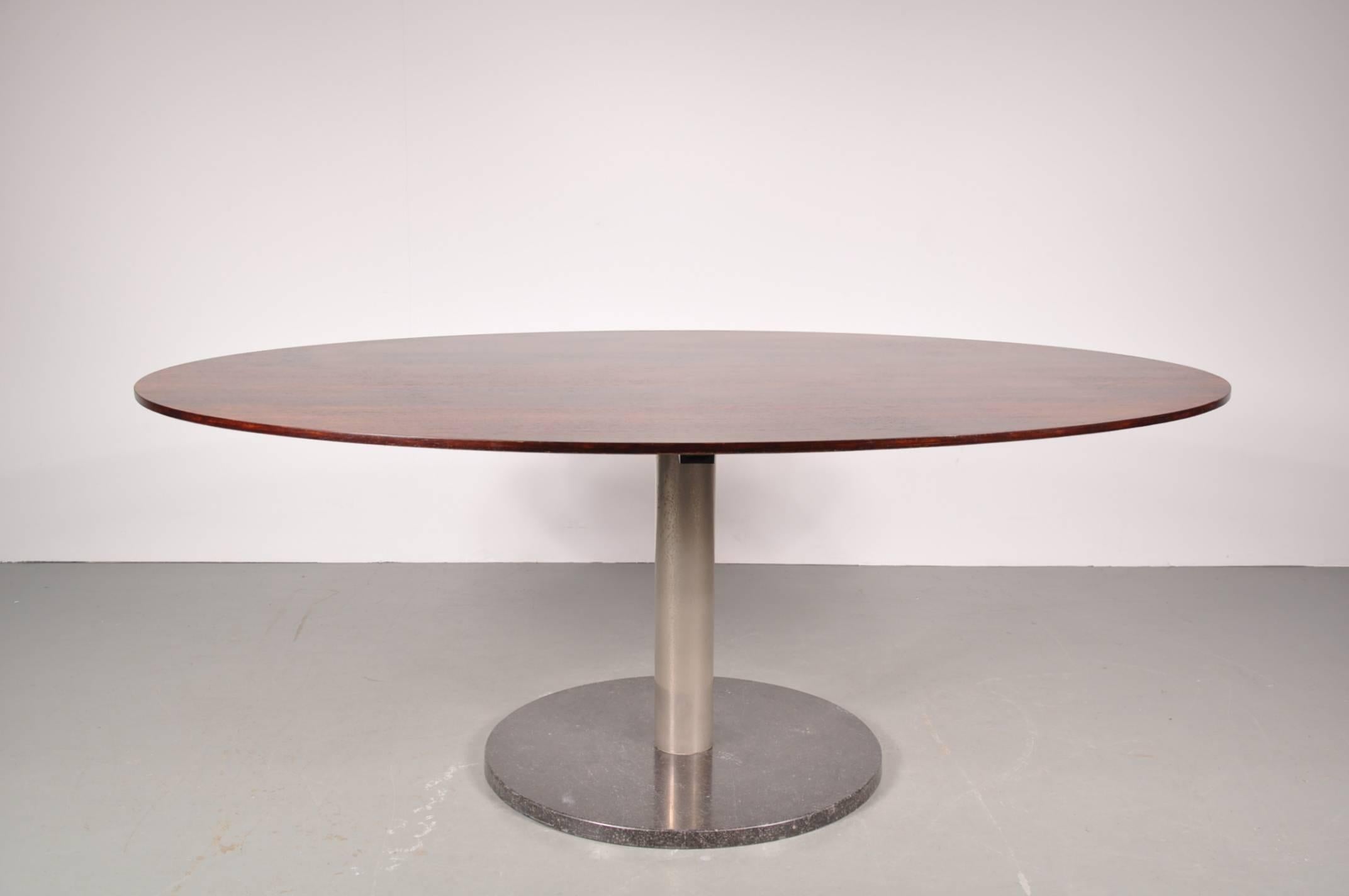 Beautiful dining table designed by Alfred Hendrickx, manufactured by Belform in Belgium, circa 1960.

This stunning piece is made of high quality rosewood on a chrome with marble base, giving it an eye-catching, luxurious appearance. It would make