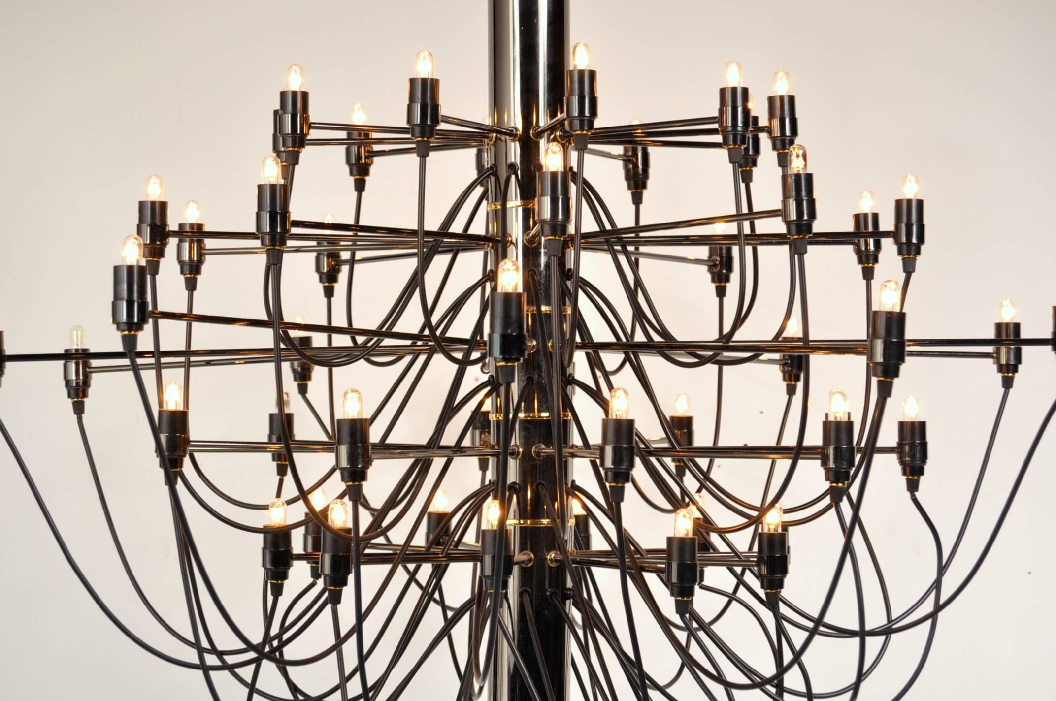Stunning large chandelier designed by Gino Sarfatti, manufactured by Flos in Italy, circa 1970.

These beautiful piece contains 50 light bulbs, making it an absolute eyecatcher in any room. It is made of high quality black chrome plated metal with