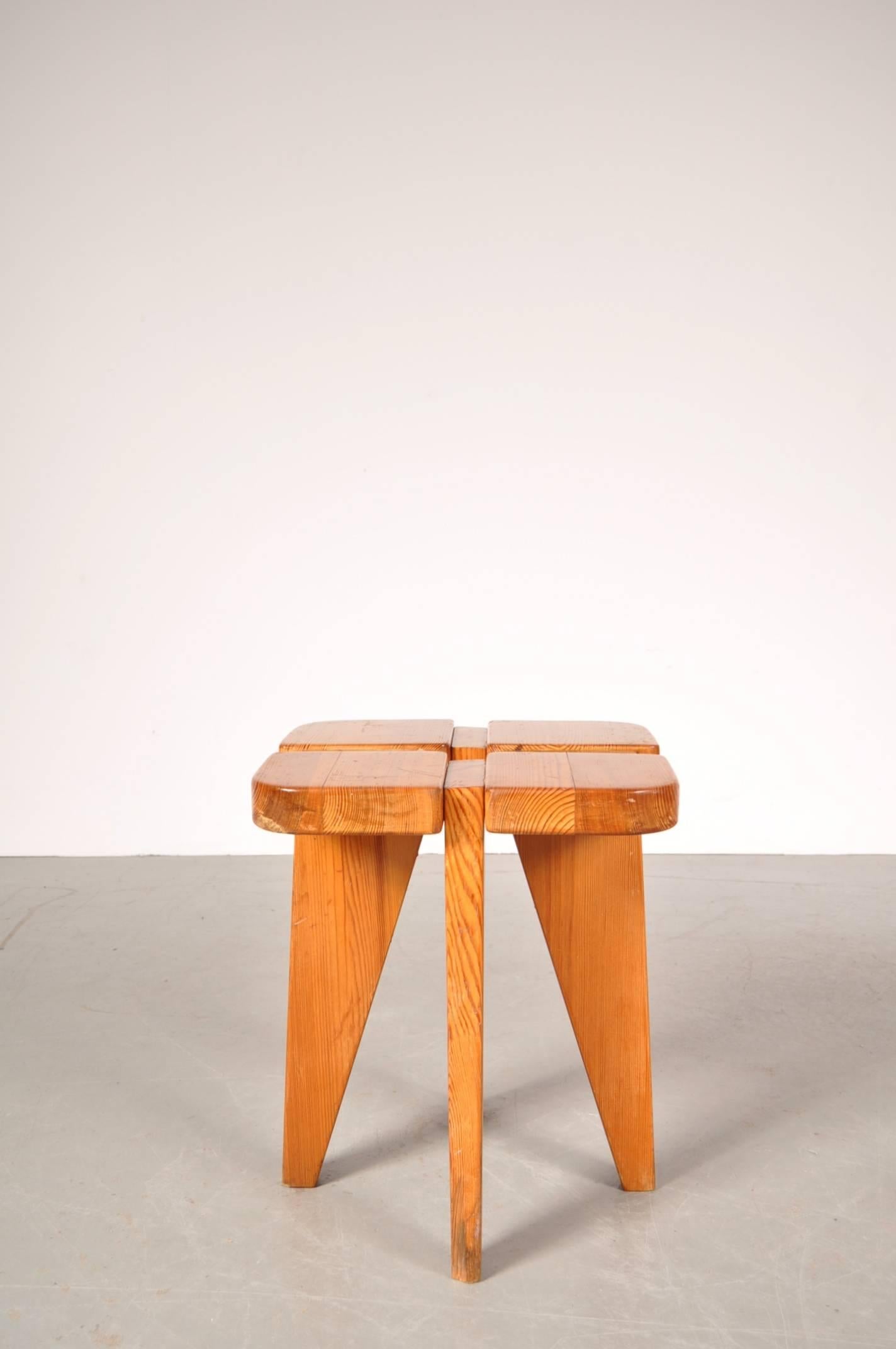 Lovely stool designed by Lisa Johansson-Pape, manufactured by Stockmann AB, Kervo Woodwork Factory in Helsinki, circa 1950.

This very recognizable piece is completely made of beautiful quality pine wood. It has a well designed structure crafted