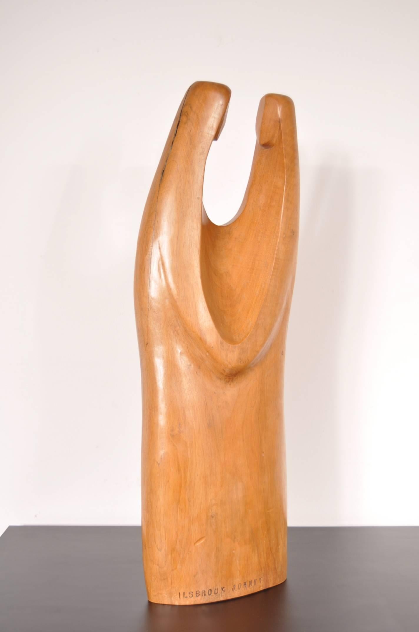 Beautiful wooden sculpture by Johnny Ilsbroux, made in Belgium, 1974.

It is an amazingly crafted sculpture and very well finished. Entirely made of the same piece of wood. Very well sculpted into a beautiful, organic shape. This rare Belgium piece