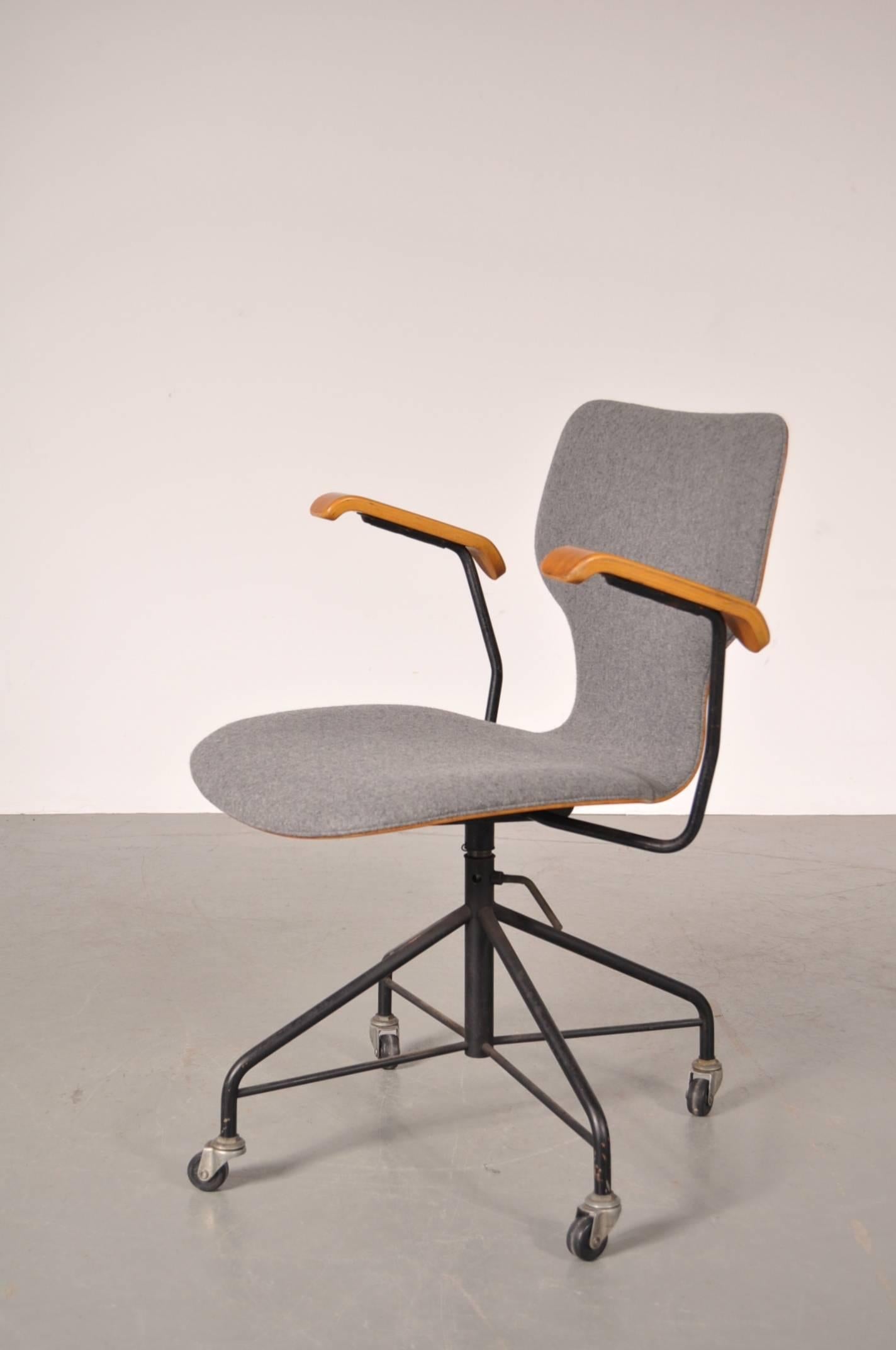 Unique office chair designed by Isamu Kenmochi, manufactured by Tendo in Japan in the 1950s.

This beautiful table is a very representative piece for Japanese furniture thanks to it’s unique, organic design. The seat and back are upholstered in