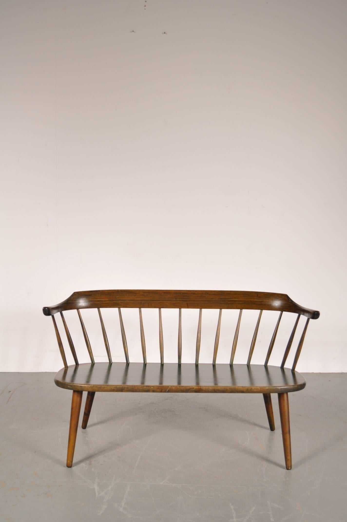 Beautiful rare bench designed by Yngve Ekstrom, manufactured by Småland in Sweden around 1950.

This unique piece is completely made of beautiful green stained birch wood. It comes with a comfortable wool cushion that gives it a nice finishing