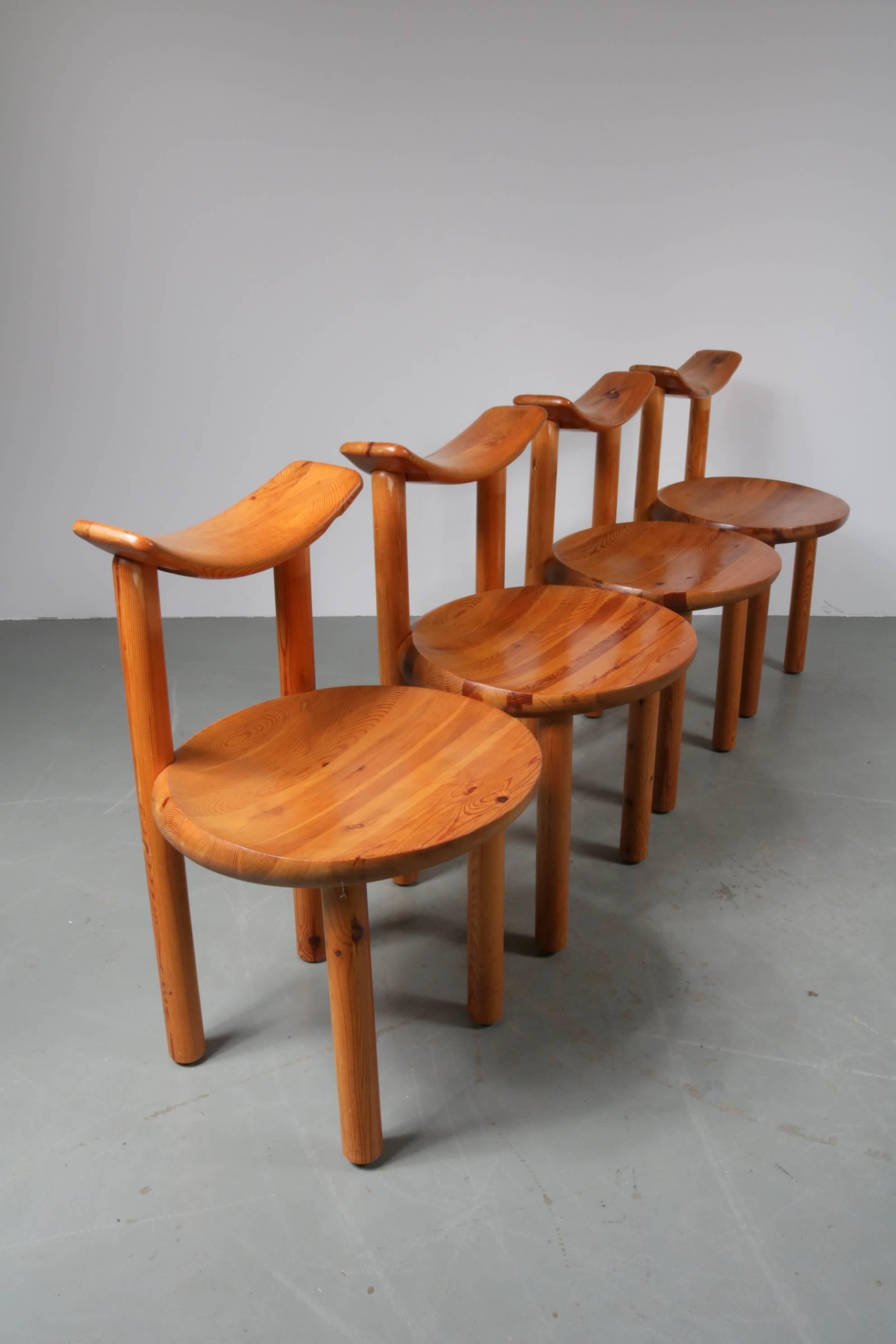 Amazing set of four dining chairs designed by Rainer Daumiller, manufactured by Hirtshals Sawmill in Denmark, circa 1970.

This impressive set contains four dining chairs, made in the highest quality solid pinewood in the natural rich brown /
