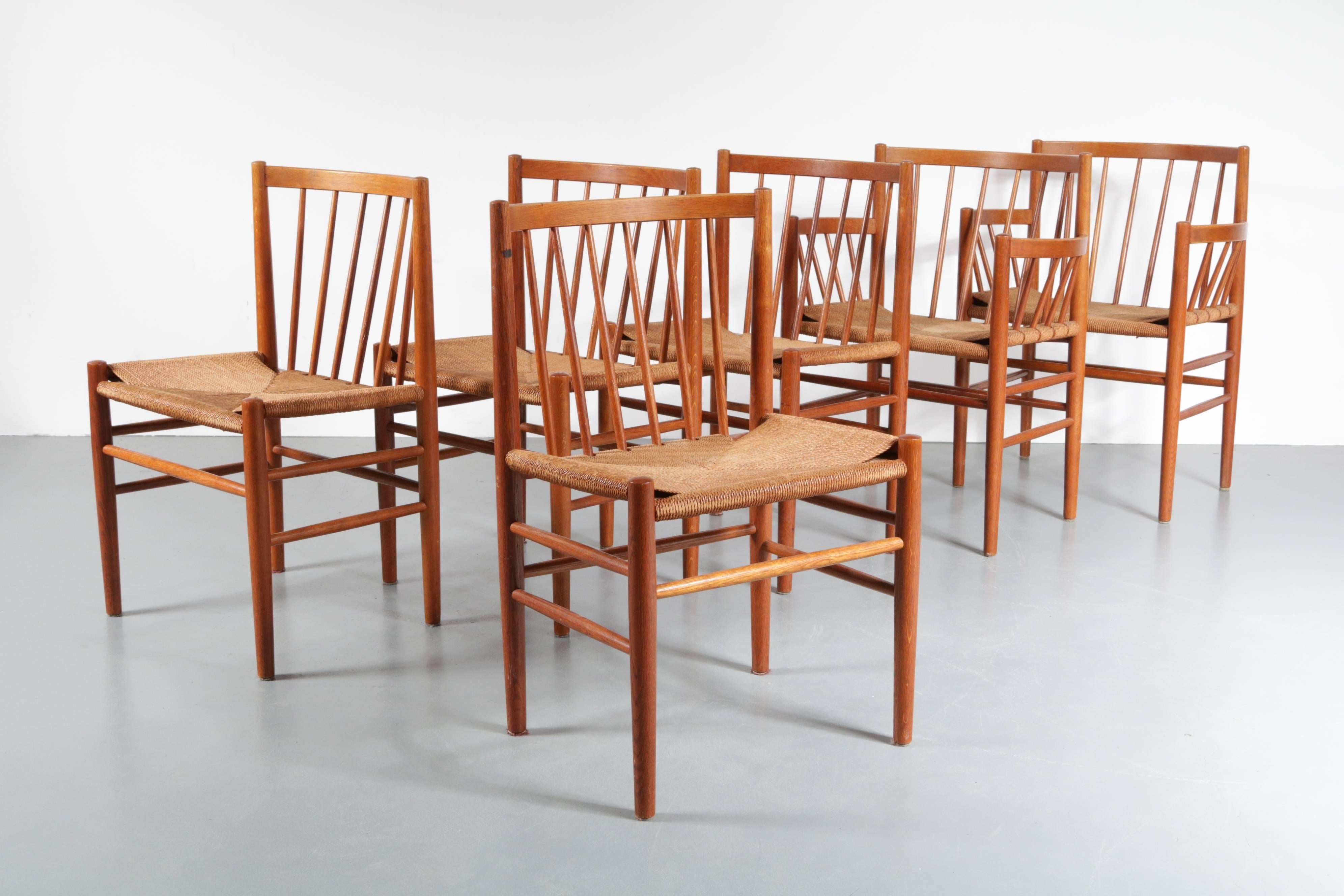 A beautiful set of six dining chairs designed by Jorgen Baekmark for FDM Mobler in Denmark, circa 1950.

These wonderful pieces of Danish design are made of high quality teak wood with rush/papercord upholstery. They are beautifuly designed with