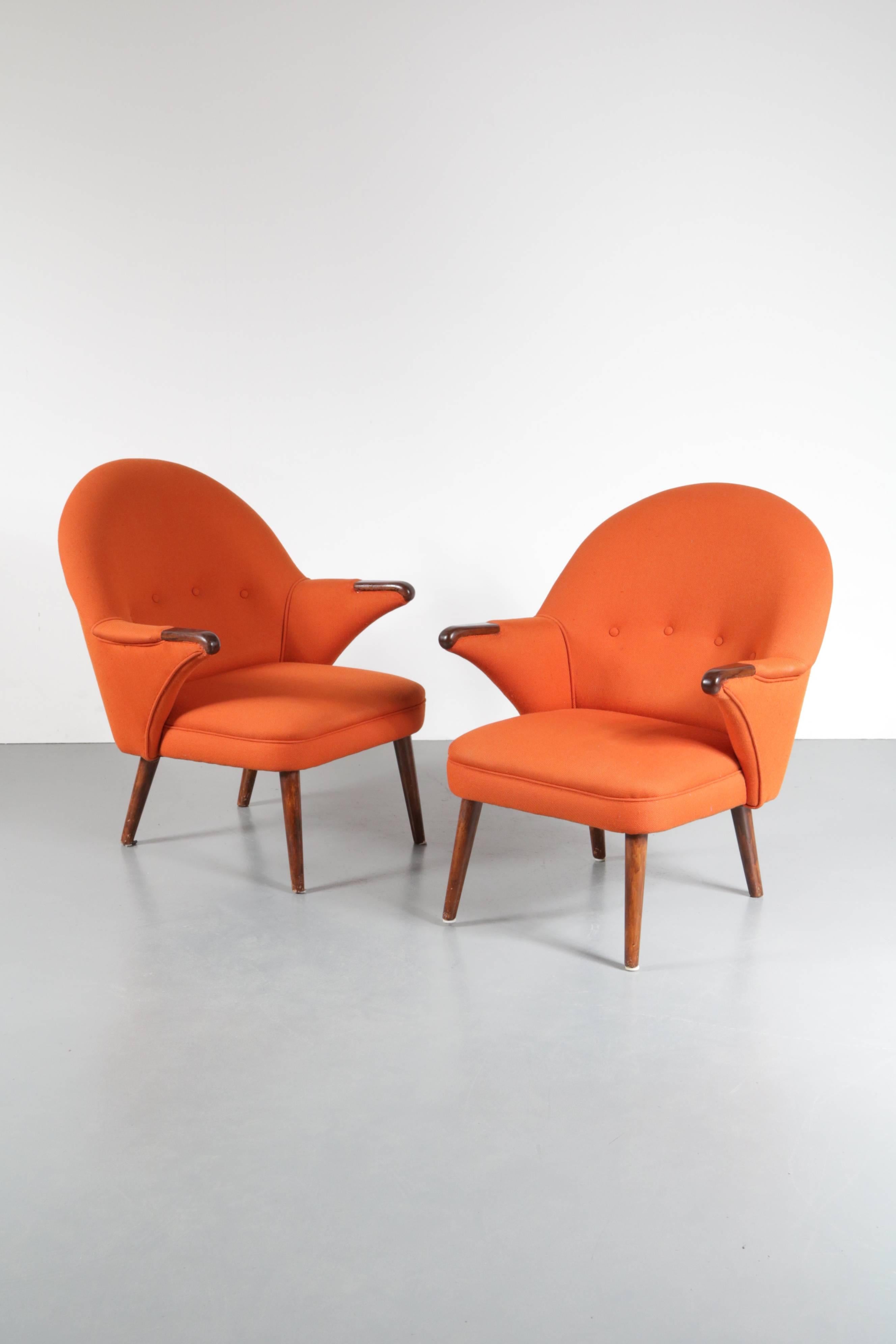 A beautiful pair of lounge chairs in the style of Hans J. Wegner's Papa Bear manufactured, circa 1950.

We are not sure about the designer of these chairs, but they resemble a smaller version of the famous Papa Bear by Hans J. Wegner. They are very