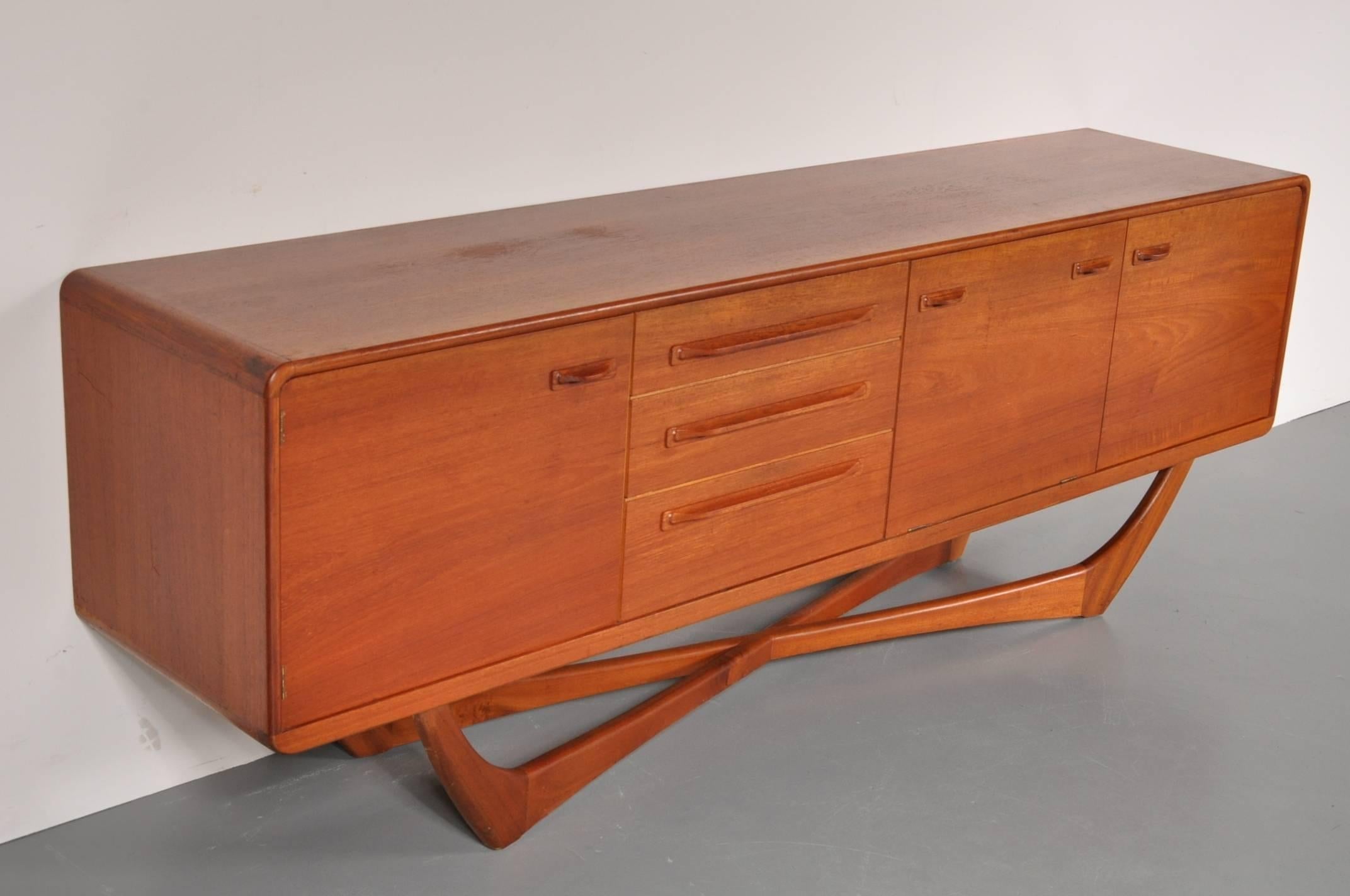 Eye-catching sideboard or credenza by Scottish manufacturer Beithcraft, made in the 1960s.

This piece has a wonderful organic shaped base, a unique finishing touch that makes this sideboard truly stand out and making it rare as well. It is made