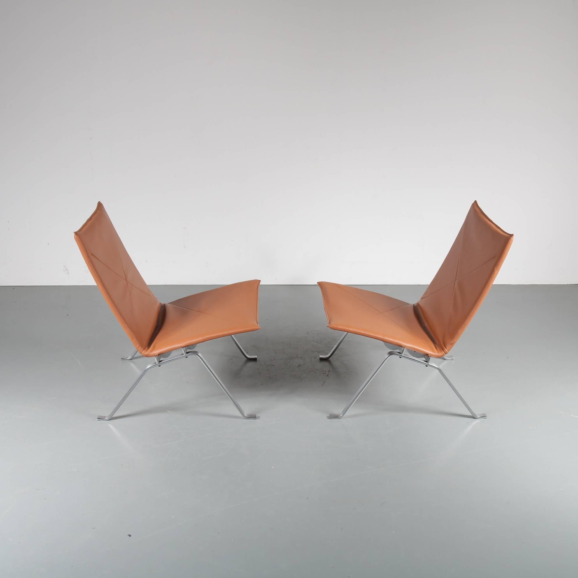A stunning pair of PK22 lounge chairs, designed by Poul Kjaerholm, manufactured by E. Kold Christensen in Denmark, circa 1960.

The chair has a beautiful chrome-plated metal base. It is newly upholstered in high quality aniline leather in a