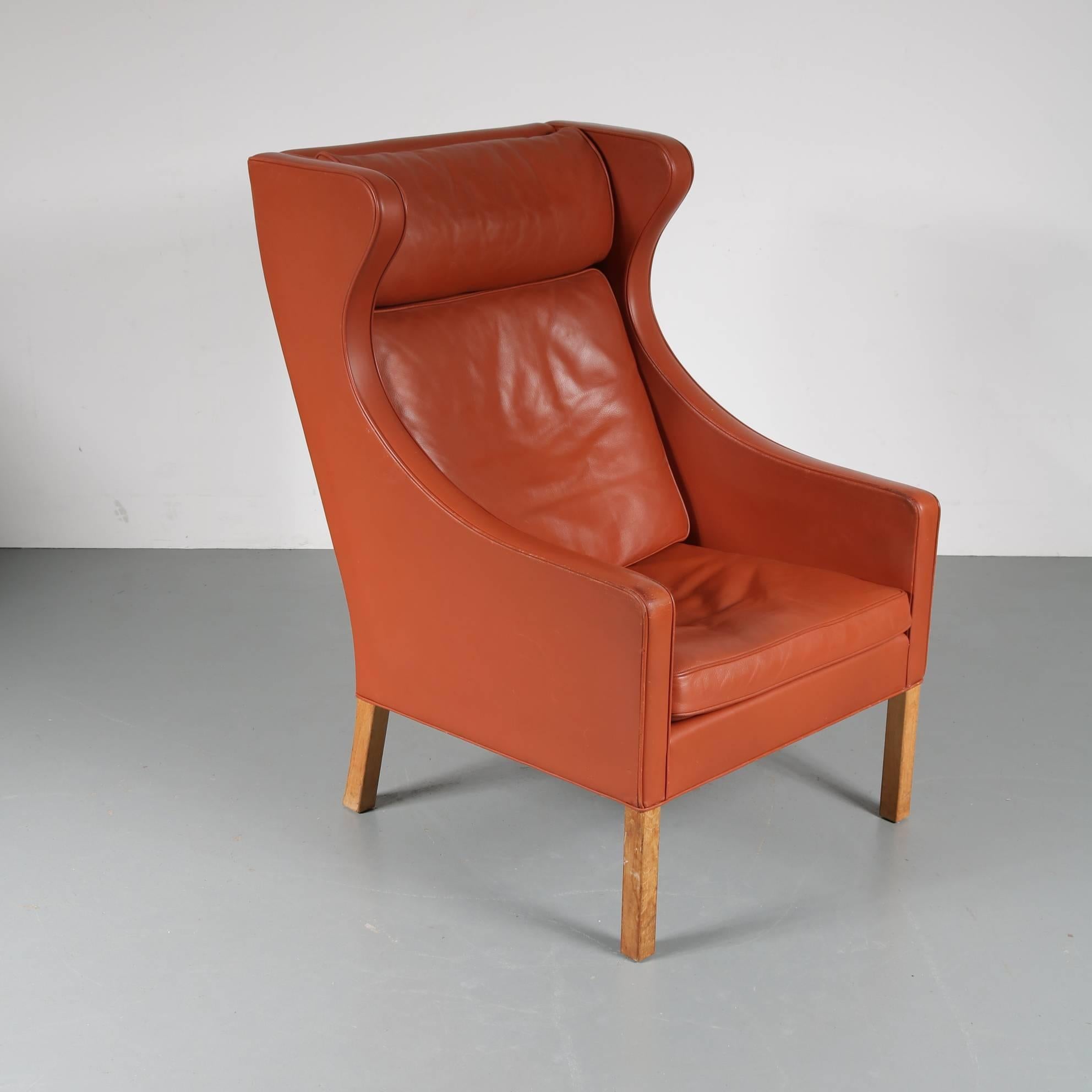 High back wingchair designed by Børge Mogensen, manufactured by Fredericia in Denmark, circa 1960.

This beautiful seat has a sharply defined outline and a soft, inviting interior. This made it one of his most iconic designs. It is upholstered in
