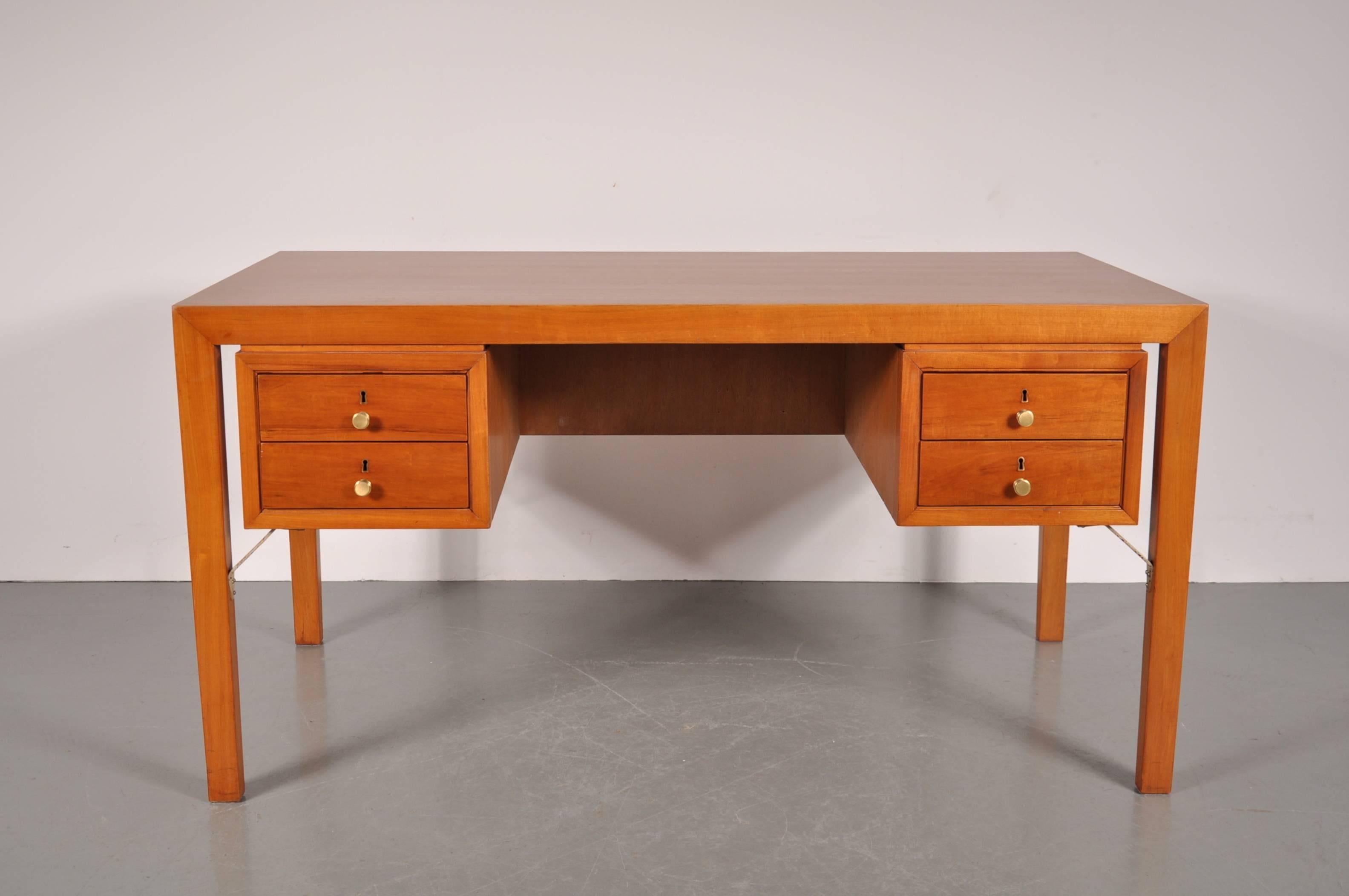 Unique desk manufactured in France around 1950.

This rare piece is made of the highest quality beech wood and has beautiful, well-crafted details on the sides and back, making this desk fit not only against a wall but also in the middle of a