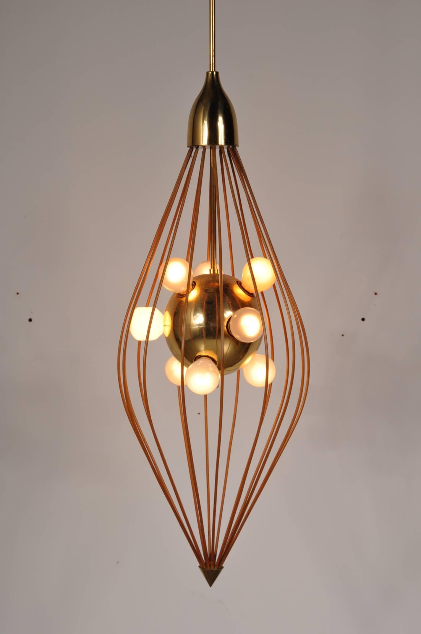 Stunning ceiling lamp in the style of Angelo Lelli / Arredoluce, manufactured in Italy, circa 1950.

The lamp is made of the highest quality brass. It is made of plastic covered metal rods in a diamond shape with several light bulbs in the middle.