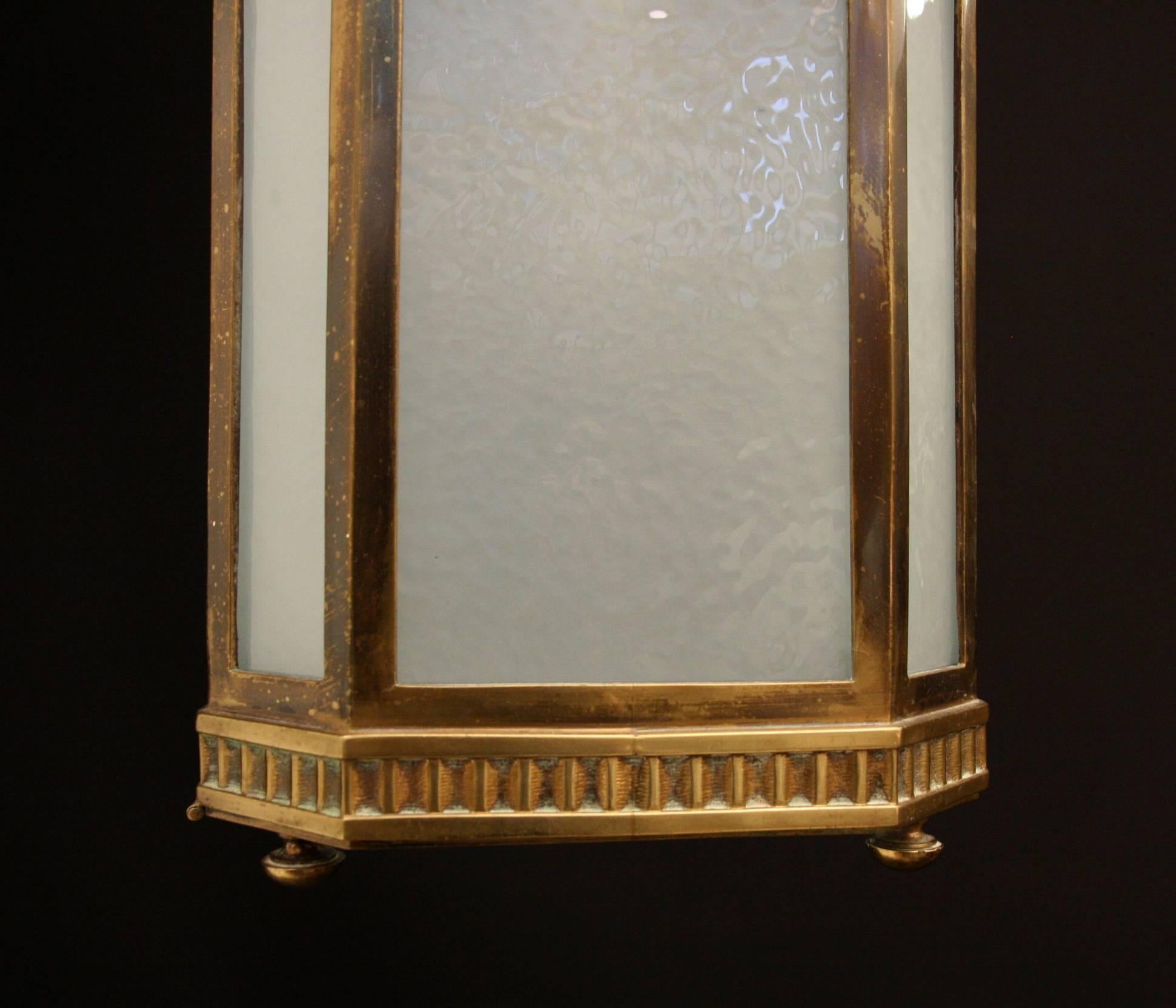 English A pair of Art Deco Frosted Glass and Bronze Lanterns