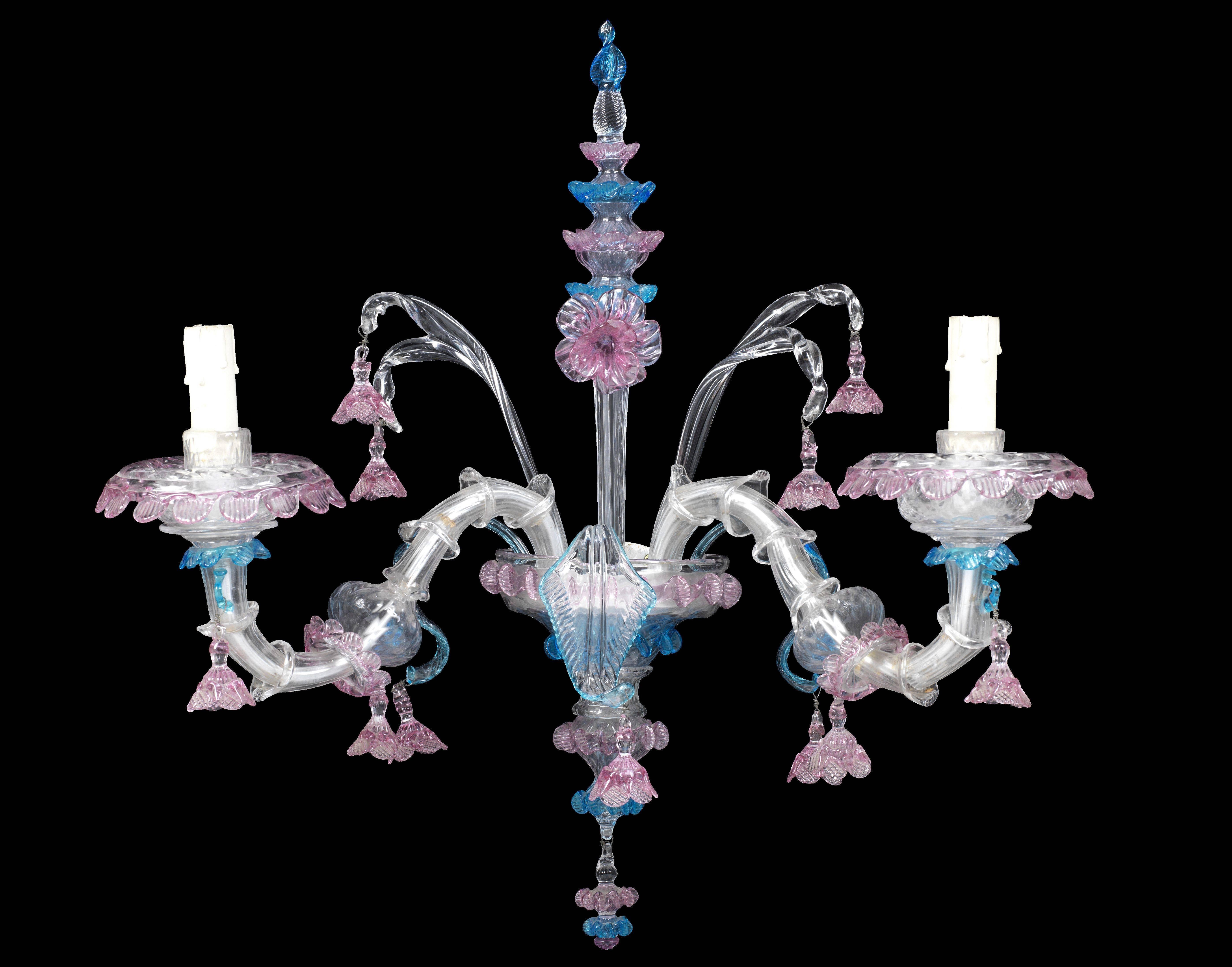 A pair of Venetian clear, pink and blue colored glass twin branch wall lights, with S-scroll arms, foliage and colored glass bell flowers.