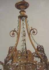 An unusual gilt brass and cut glass chandelier