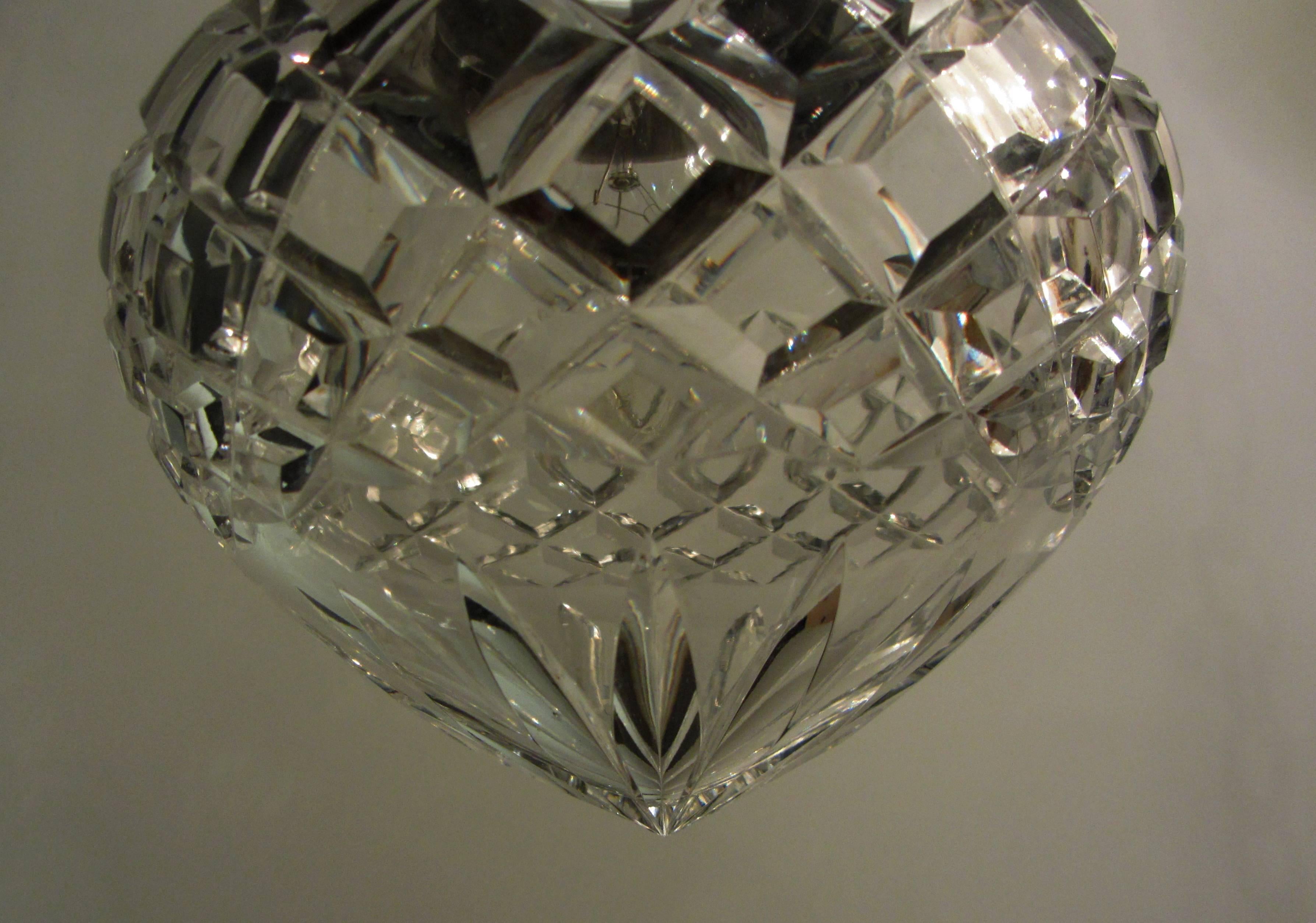 A charming cut-glass single bulb pendent light with silvered fittings.