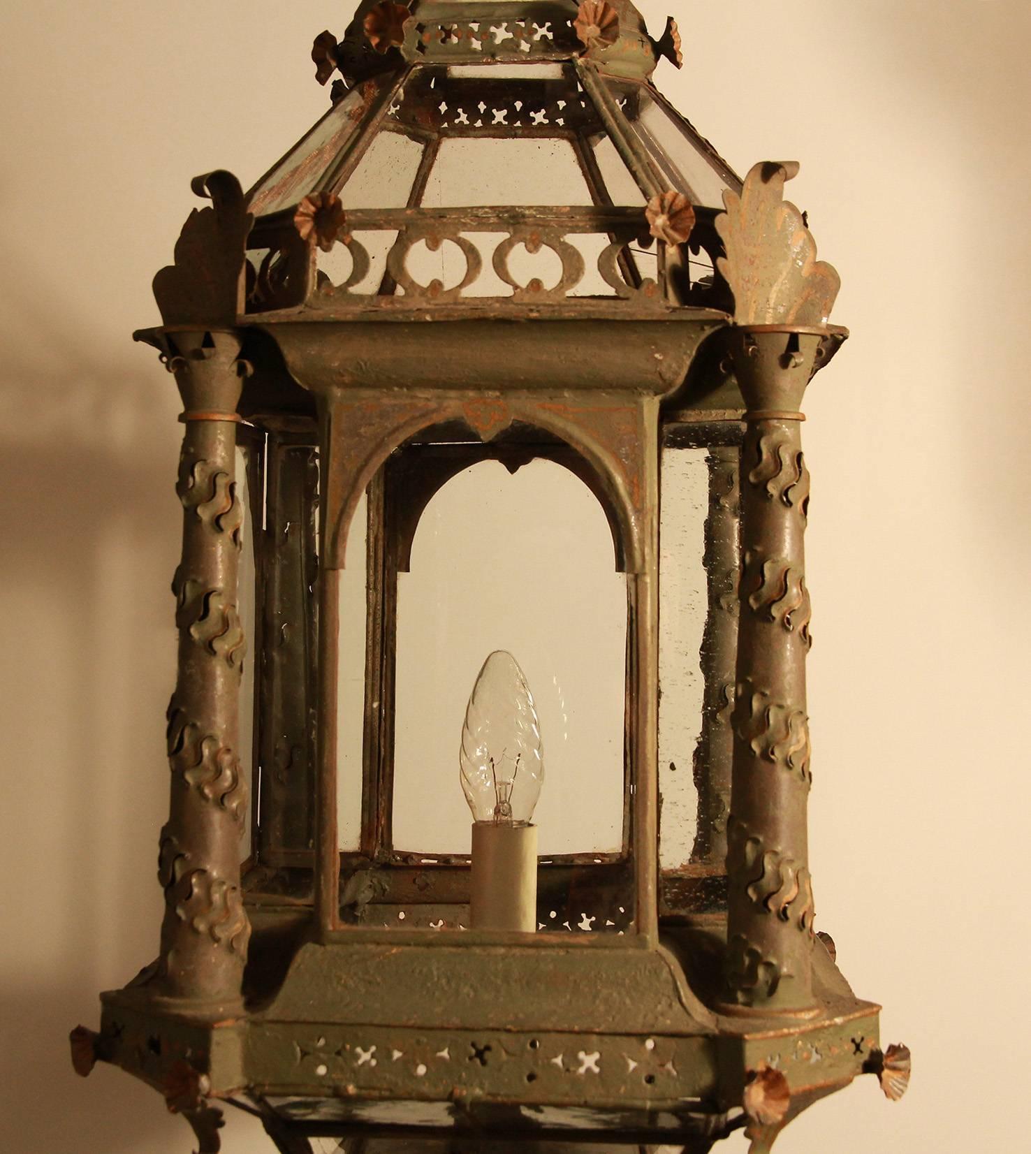 A parcel-gilt antique green painted tole bevelled square lantern, finely done, circa 1790.