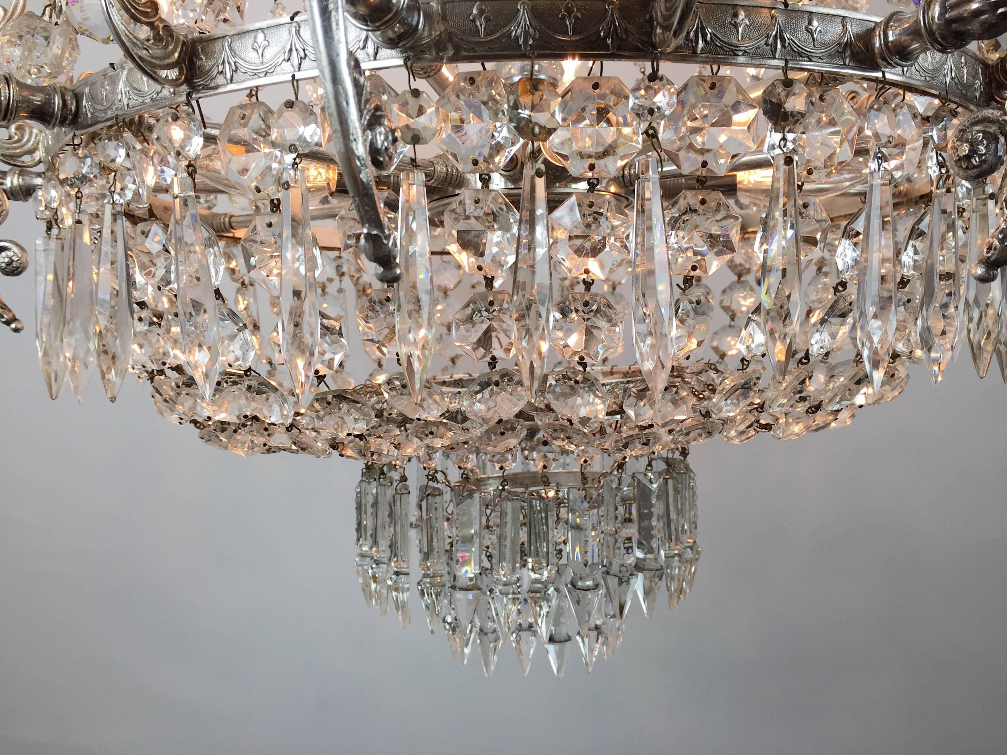 Spanish Pair of Late 19th Century Silvered Brass Bag and Swag Chandeliers For Sale