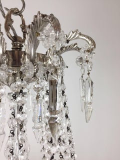 Pair of Late 19th Century Silvered Brass Bag and Swag Chandeliers