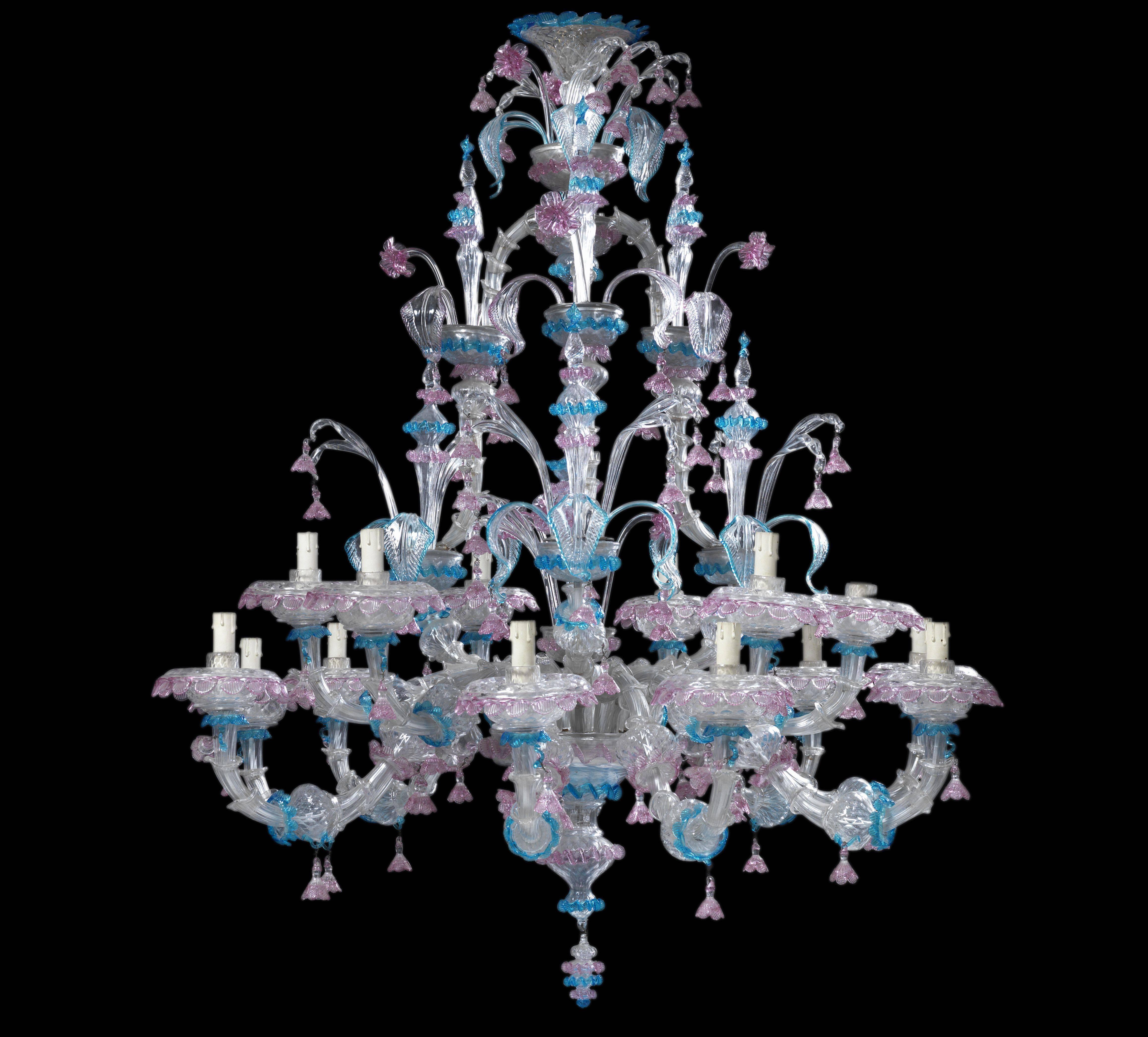 A pair of Venetian clear, pink and blue colored glass fifteen-light chandeliers, with S-scroll arms and foliage issuing from a central stem hung with colored glass bell flowers.