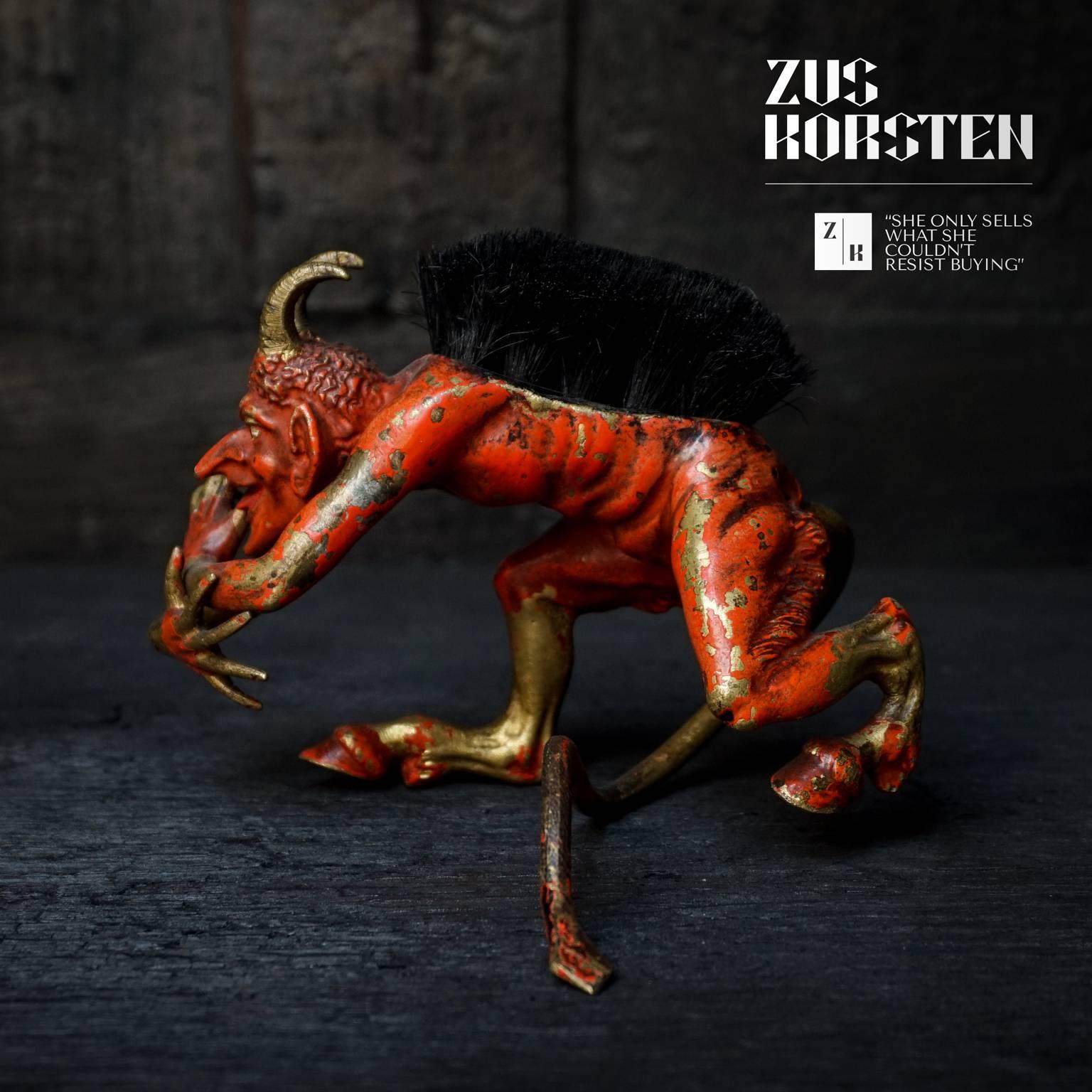 Look at this expurgated naughty little demon.
This desk devil was used to brush your pen with. Back in the days when people used a fountain or a crown pen and ink and you needed your pen brushed.
Now this polychrome cold painted bronze would look