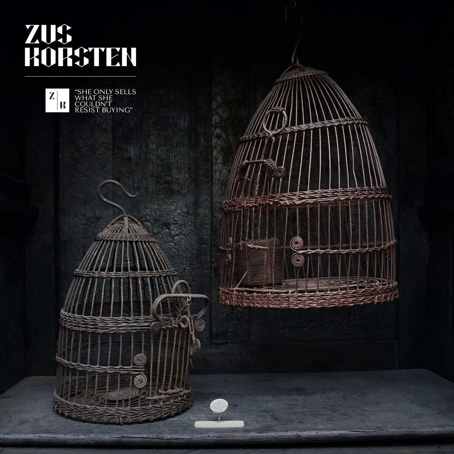This set of Bohemian chic bird cages are great for decoration. Because of the two different sizes they can be combined in a nice way.

Dimensions: Left: H 28 (with hook 33) cm D 20.
Right: H 33 (with hook 41) cm D 25.

Complimentary shipping.