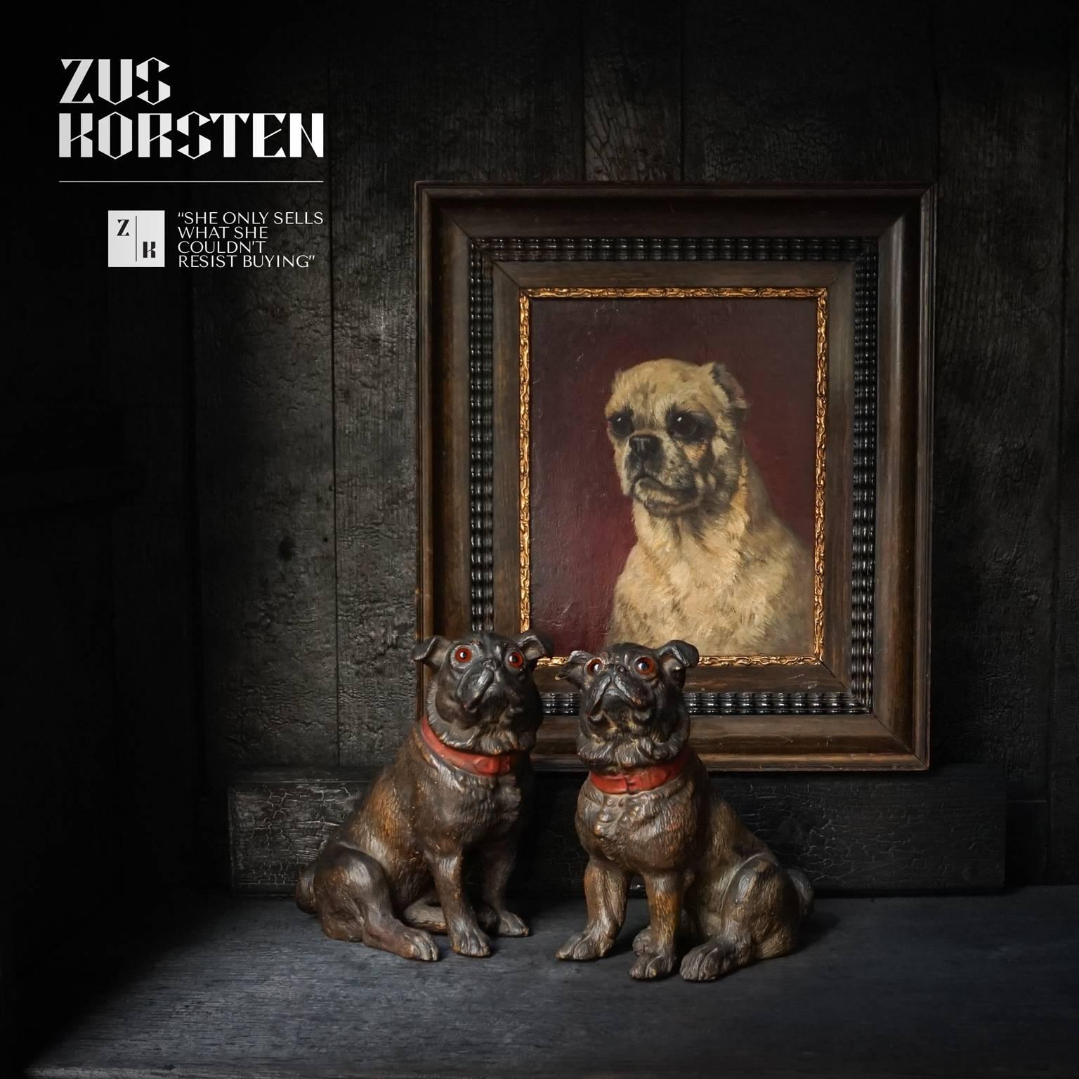 I found this very cute couple of terracotta pug dogs and immediately thought of them probably looking great with my earlier find; the Henriette Ronner pug dog painting. And they do, just look at them.

Nice decorative collectors items in very