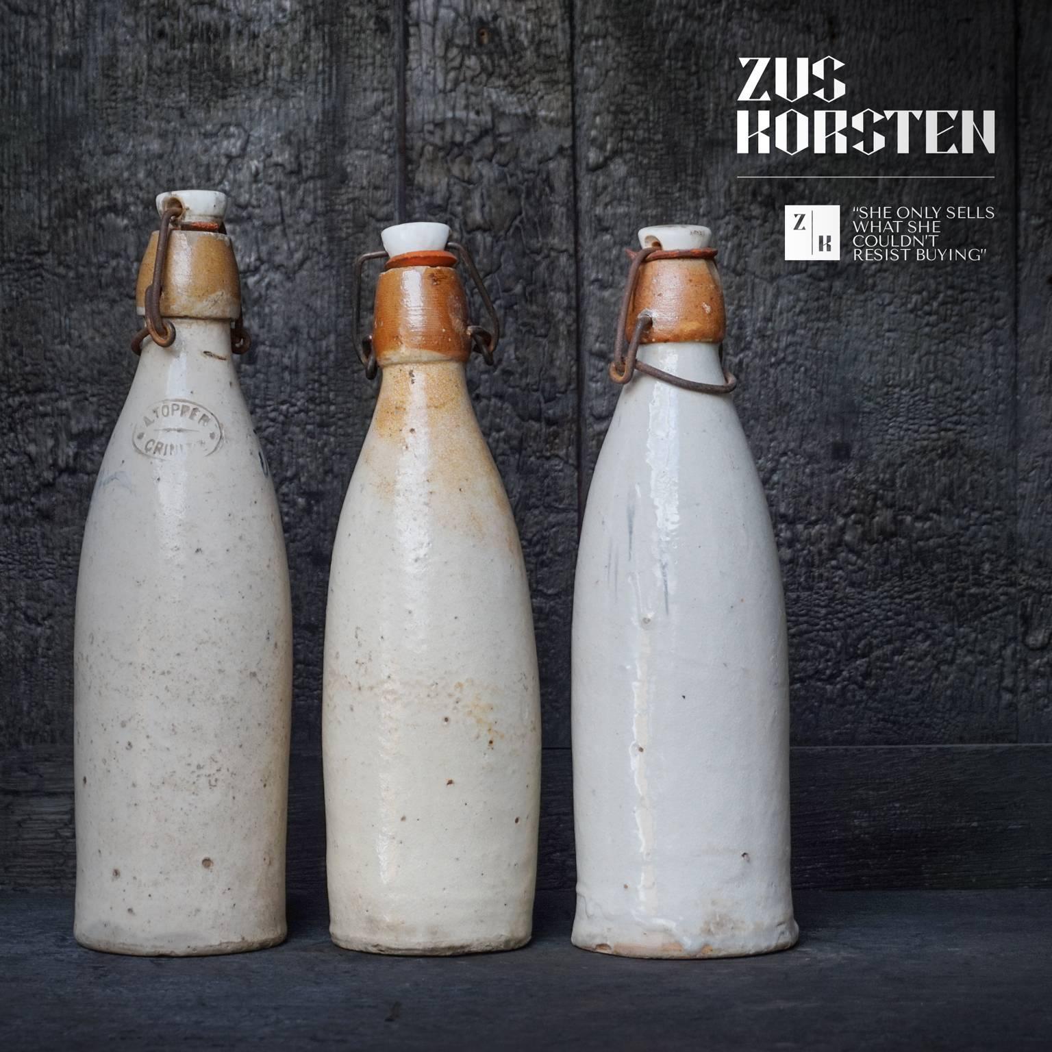 Earthenware Set of Five Early 20th Century, German Stein Beer or Weißbier Bottles