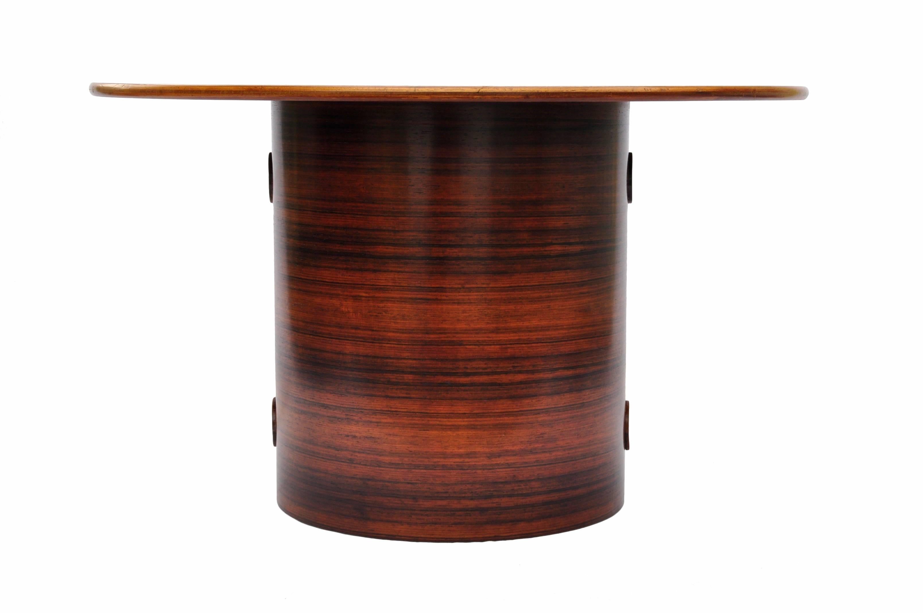 A rare and unusual coffee or center design for Knoll. The table was made in two different heights, the model shown here is the higher of the two variation. This rosewood veneer edition is an extremely rare version as the design was previously known