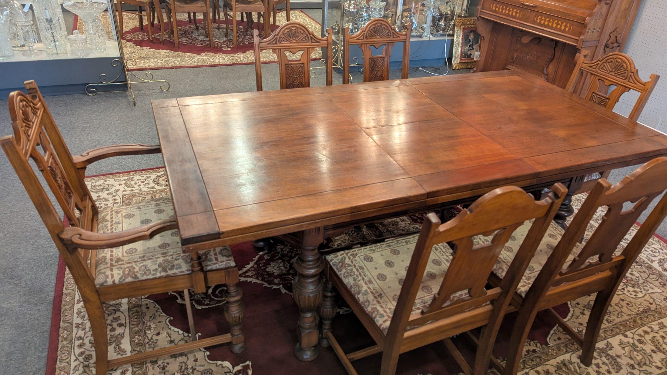 This is an awesome 1930's Jacobean dining table and 6 chairs set!  The table is 40