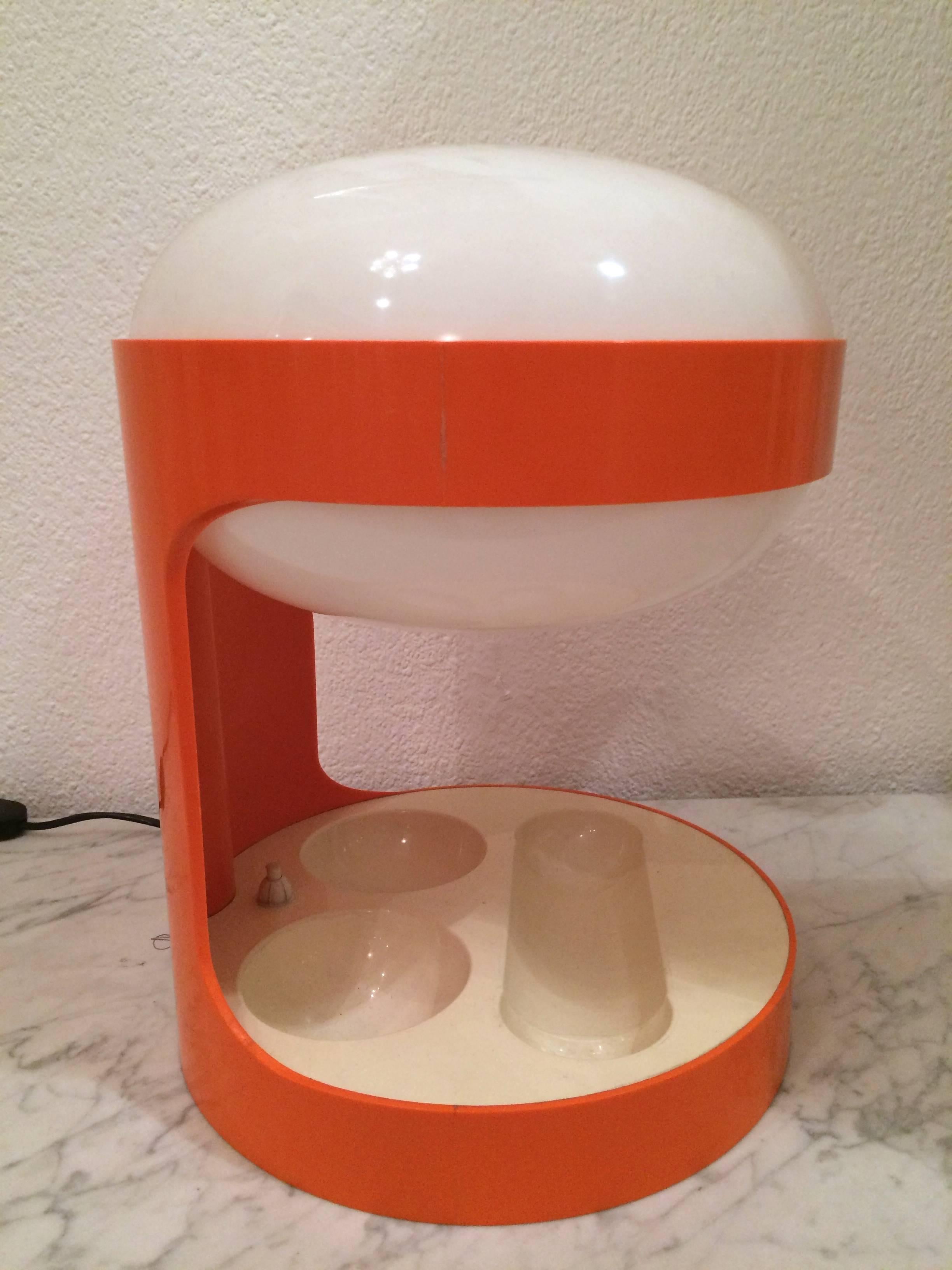 Joe Colombo KD29 orange table lamp produced by Kartell, circa 1968.
Perfect condition.
Same lamp in white available.