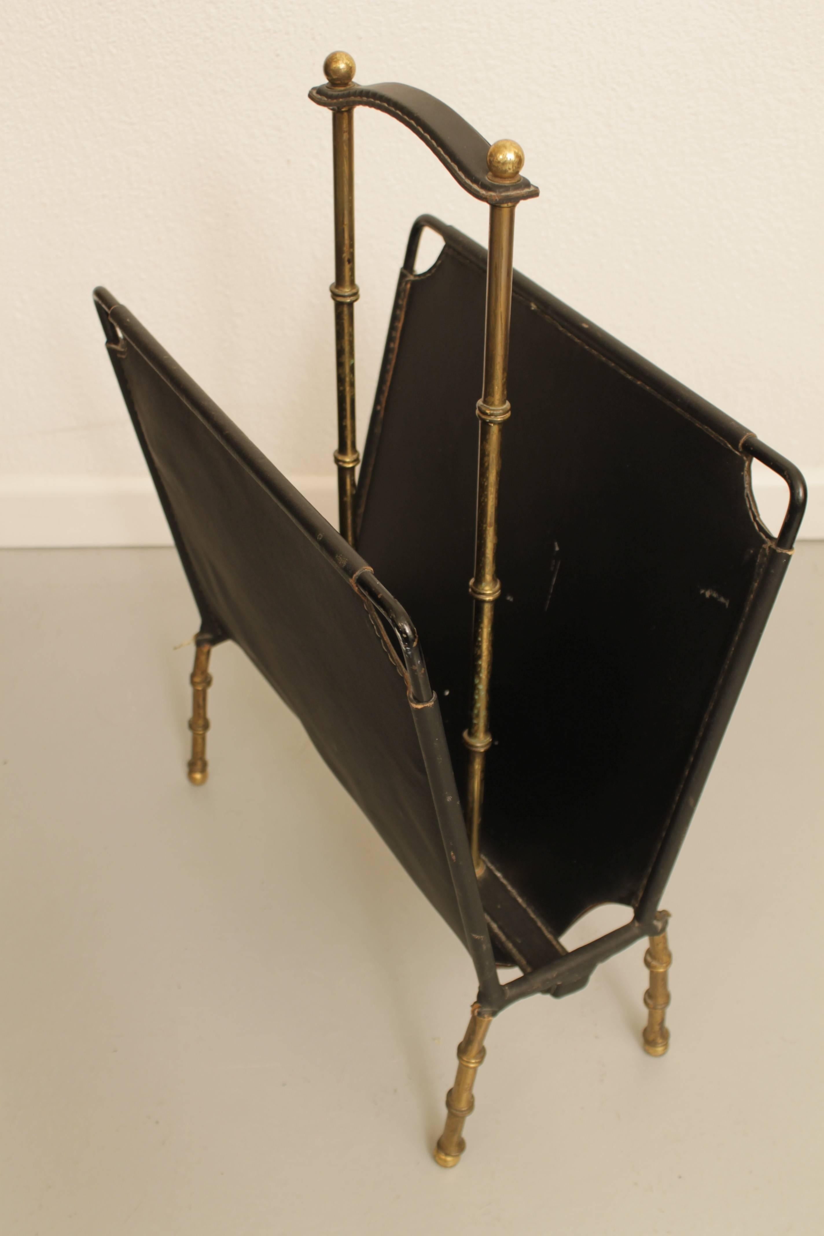 1950's hand-stitched leather and brass magazine rack by Jacques Adnet.
Very good vintage condition.
France ca.1950's
