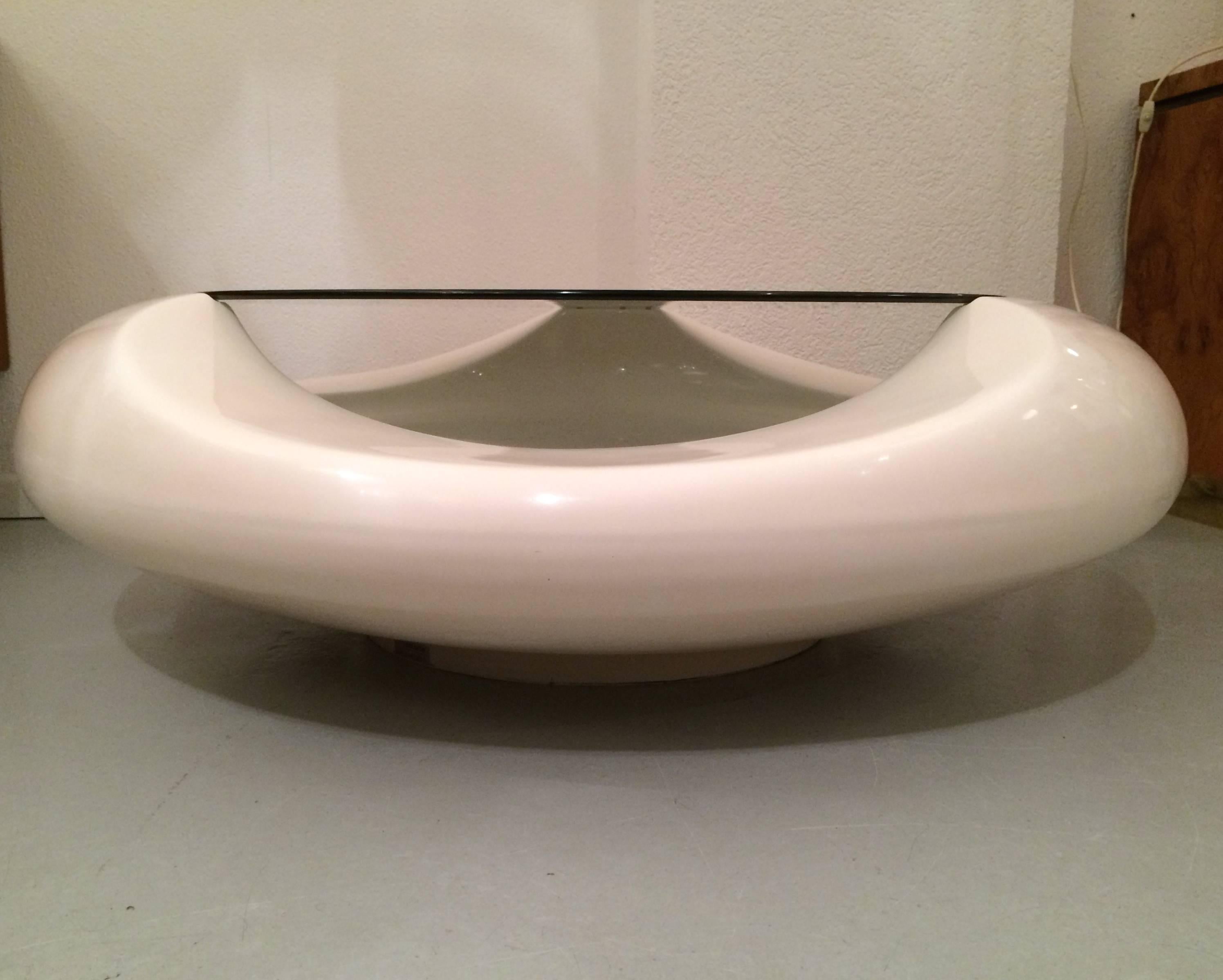 Vintage Space Age white fiberglass coffee table by Astarte Milano, circa 1970.
Smoked glass top.
Very good condition.