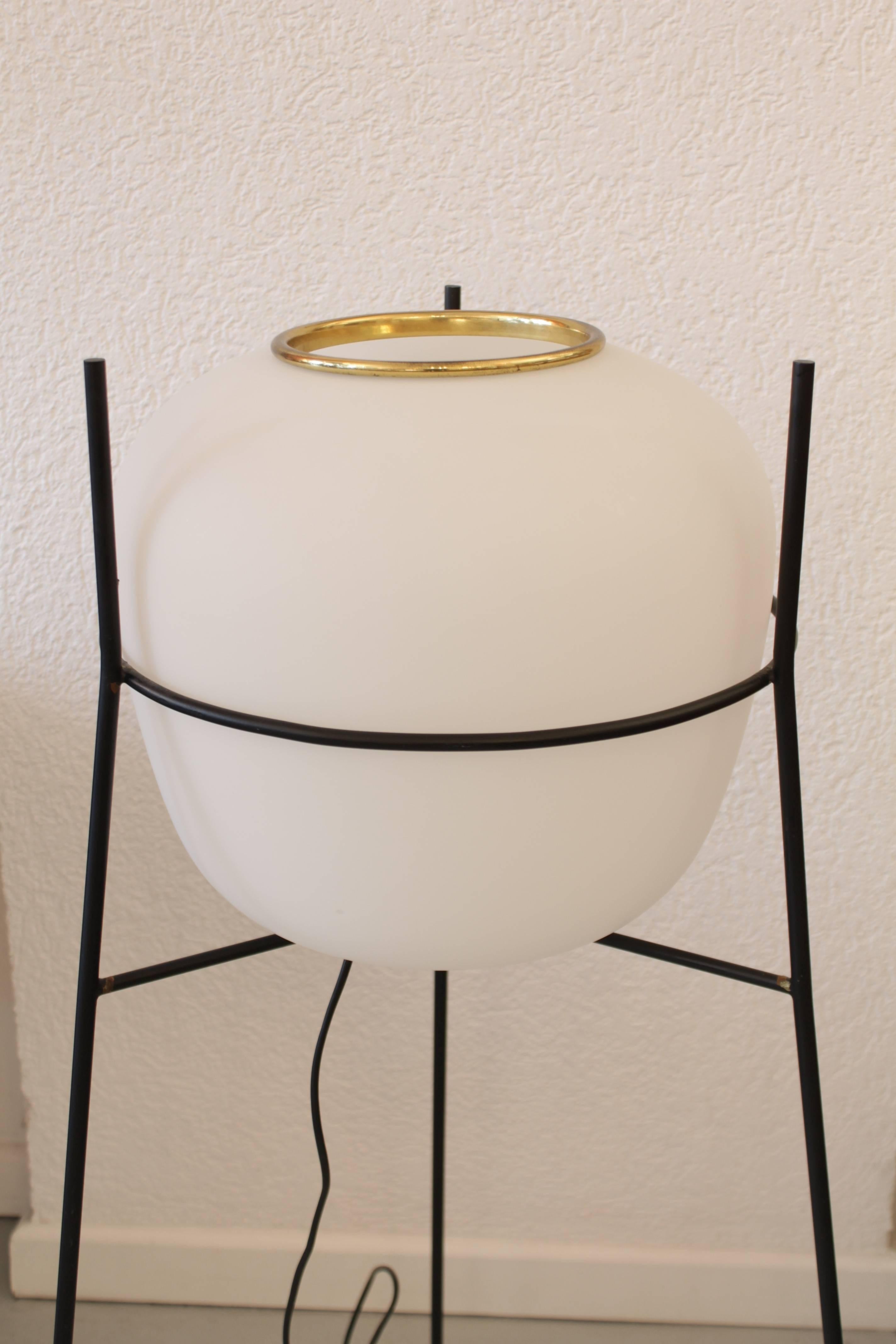 Steel, brass and glass floor lamp produced by Stilnovo, Italy, circa 1950s
Perfect condition, all original, brass glides and switch, manufacturer label on the sucket.
White satin glass.