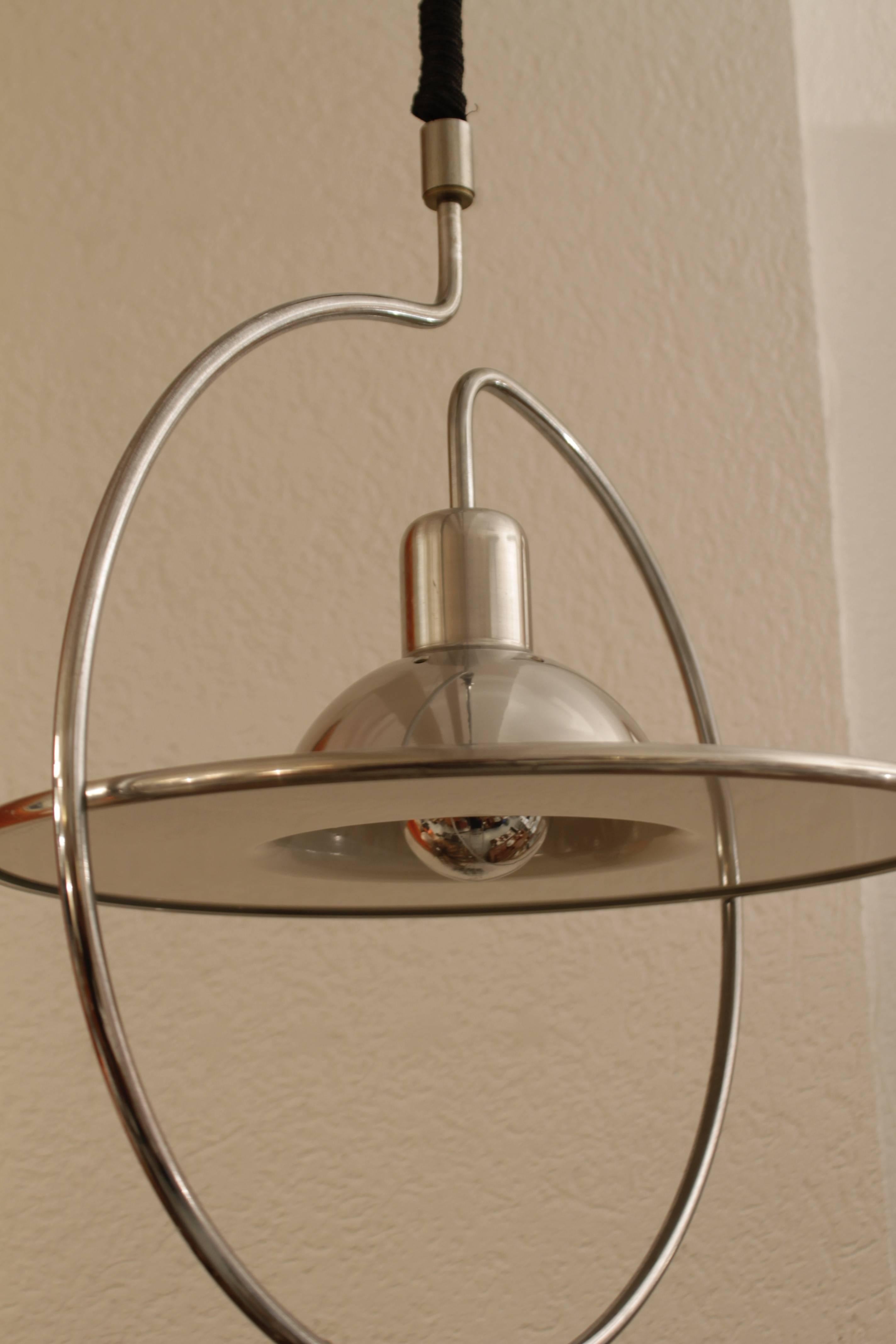 Set of Four Saturn Pendant Lamp In Excellent Condition In Geneva, CH