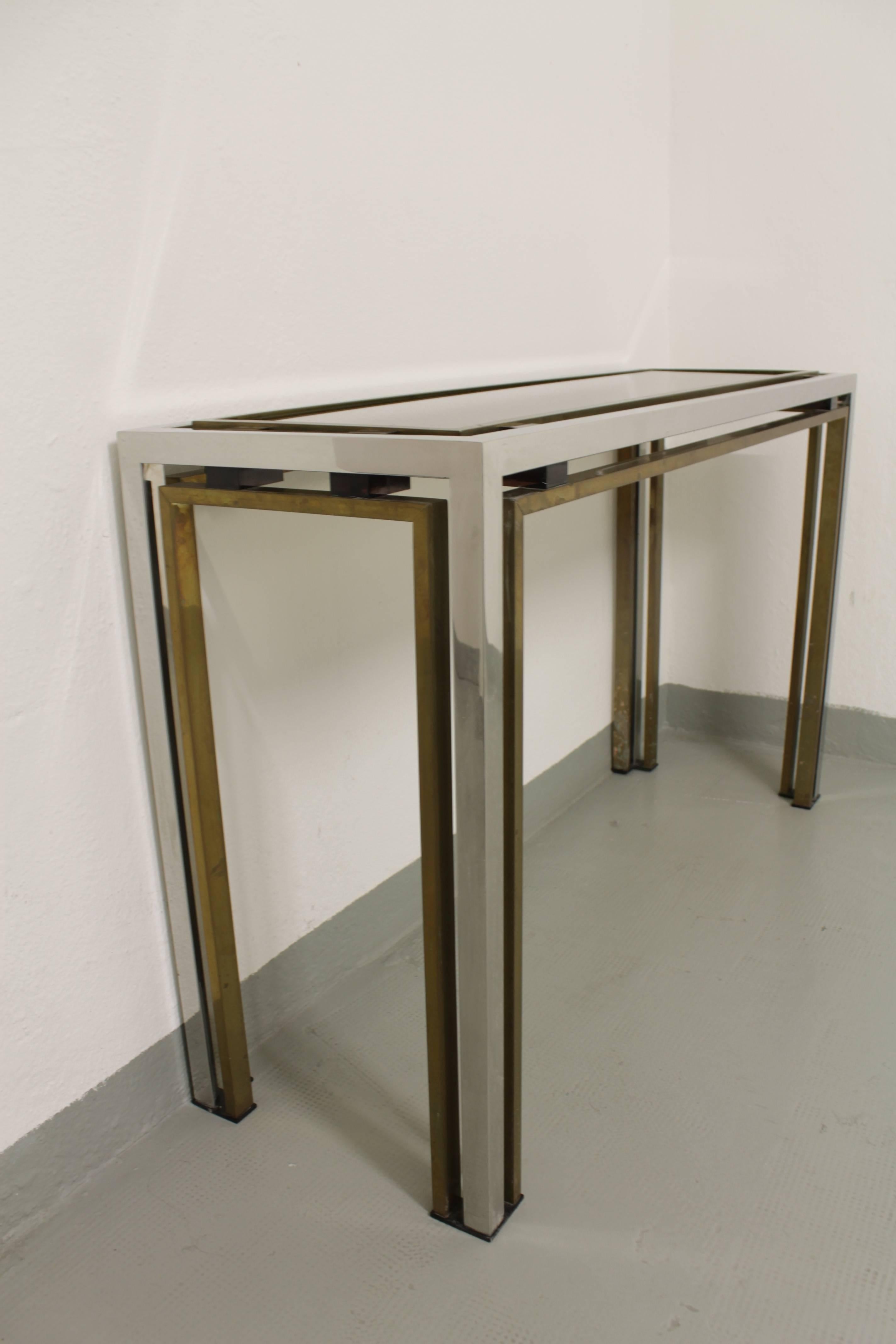 Glass, brass and chrome console by Romeo Rega, Italy, circa 1970s.
 