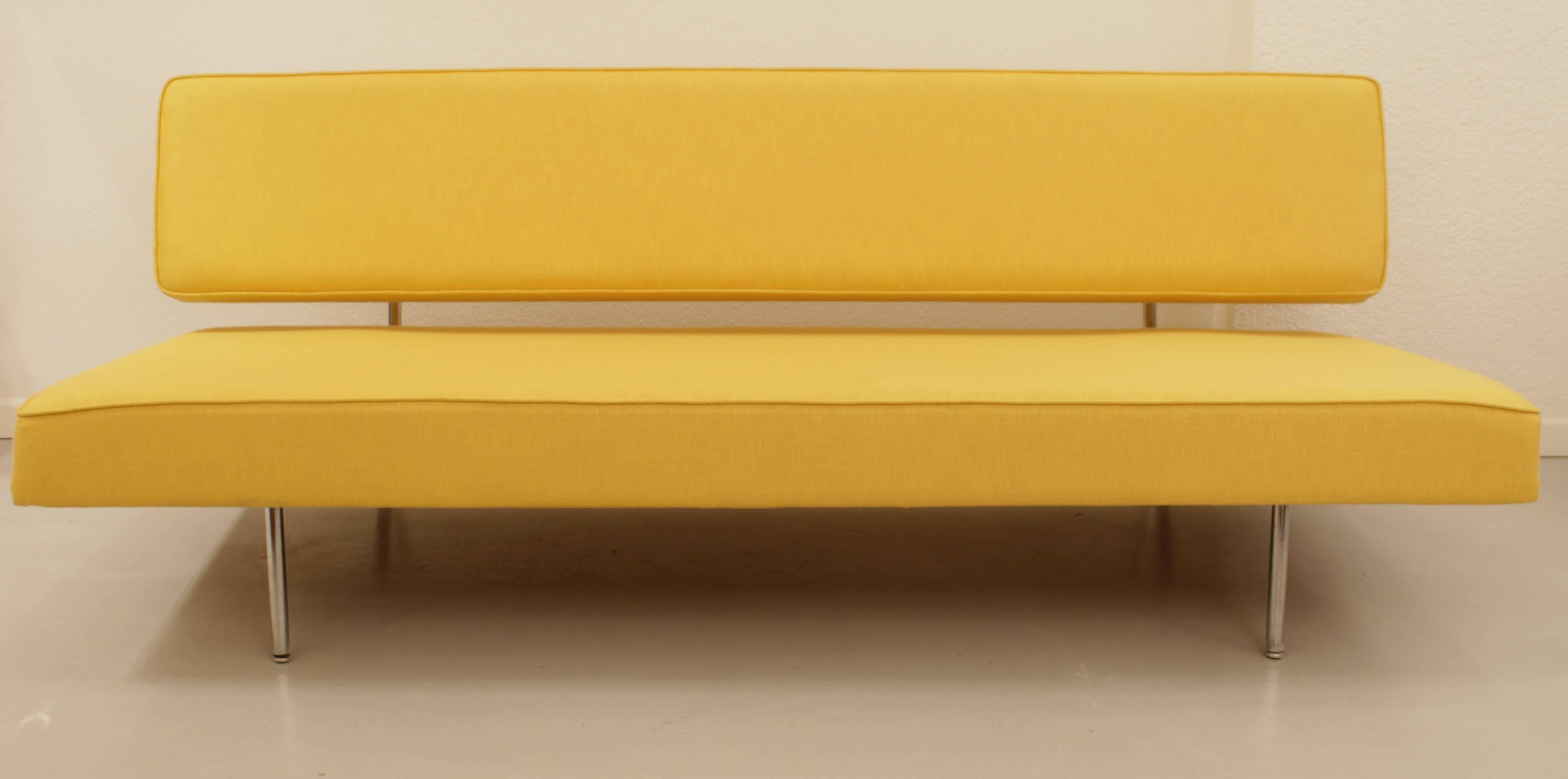 Swiss Minimalist EA 616 sofa bed by Ernst Ambuhler, produced by Wohnbedarf, circa 1958
Completely restored, new foam and bright yellow vintage fabric
Very easily convertible in bed.
 