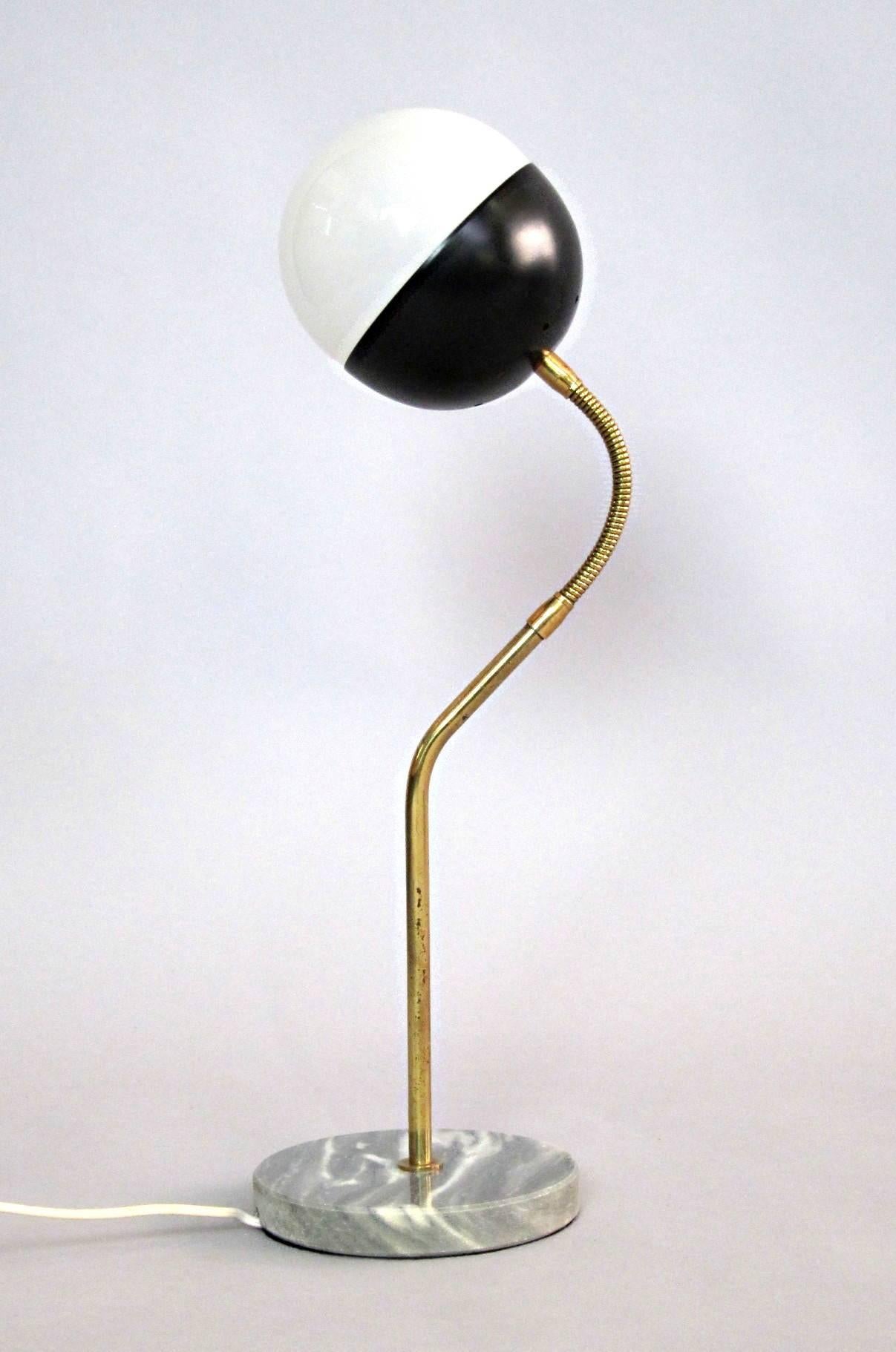 Subtitle brass goose neck lamp with opaline glass globe, marble base,
manufactured by Stilnovo, Italy 1960s.