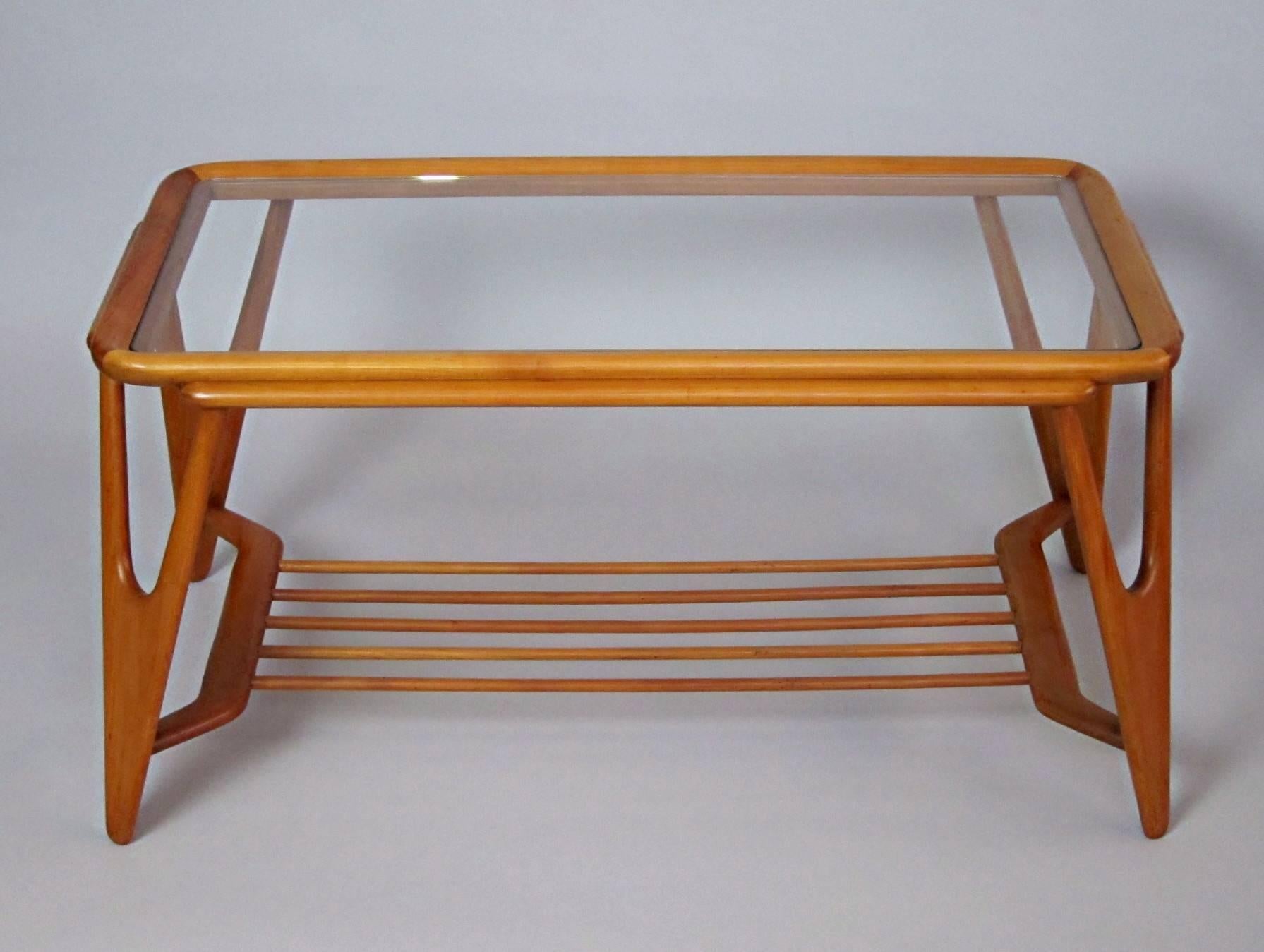 Beautiful crafted wooden Coffeetable in the Style of Cesare Lacca and Carlo Mollino, manufactured in the 1950s, new Glass Top with rounded Edges.