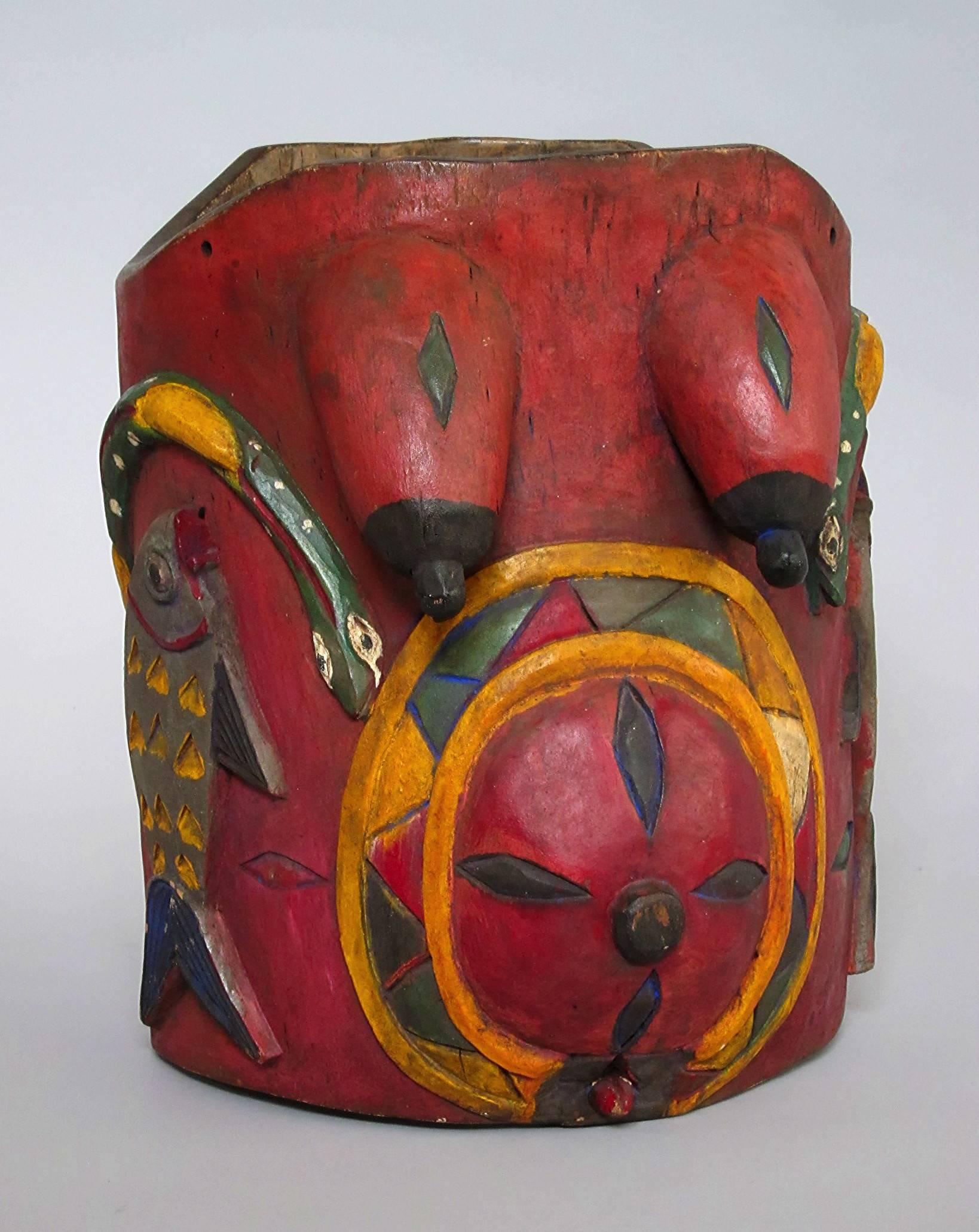 Hand-carved wooden Yoruba Gelede bund body mask for ritual male dancers,
strong colors, Nigeria Africa, 20th century.