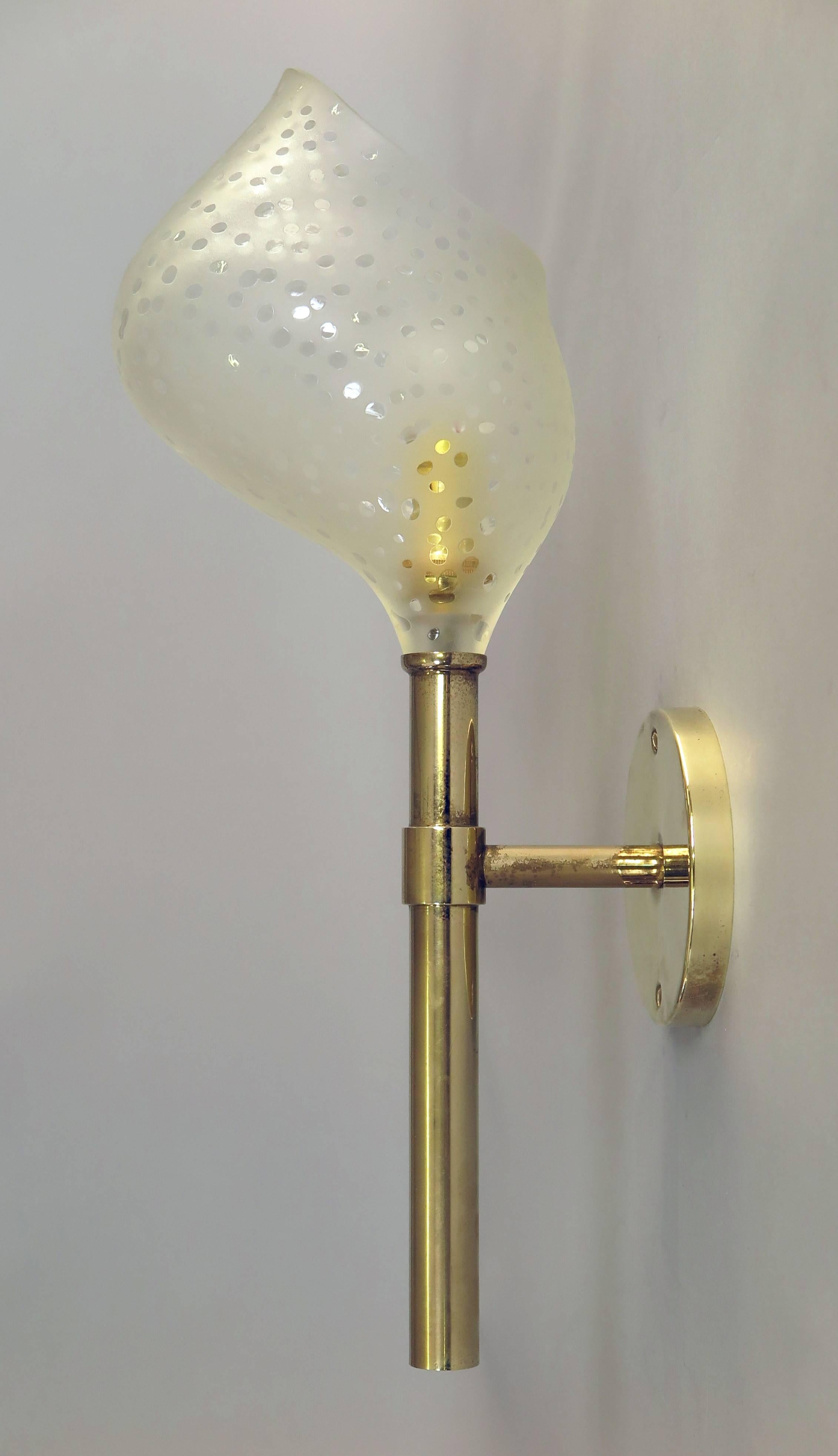 Brass sconces with flecked glass shades who give unique shadowgraphs,
rewired, bayonet lamp socket.