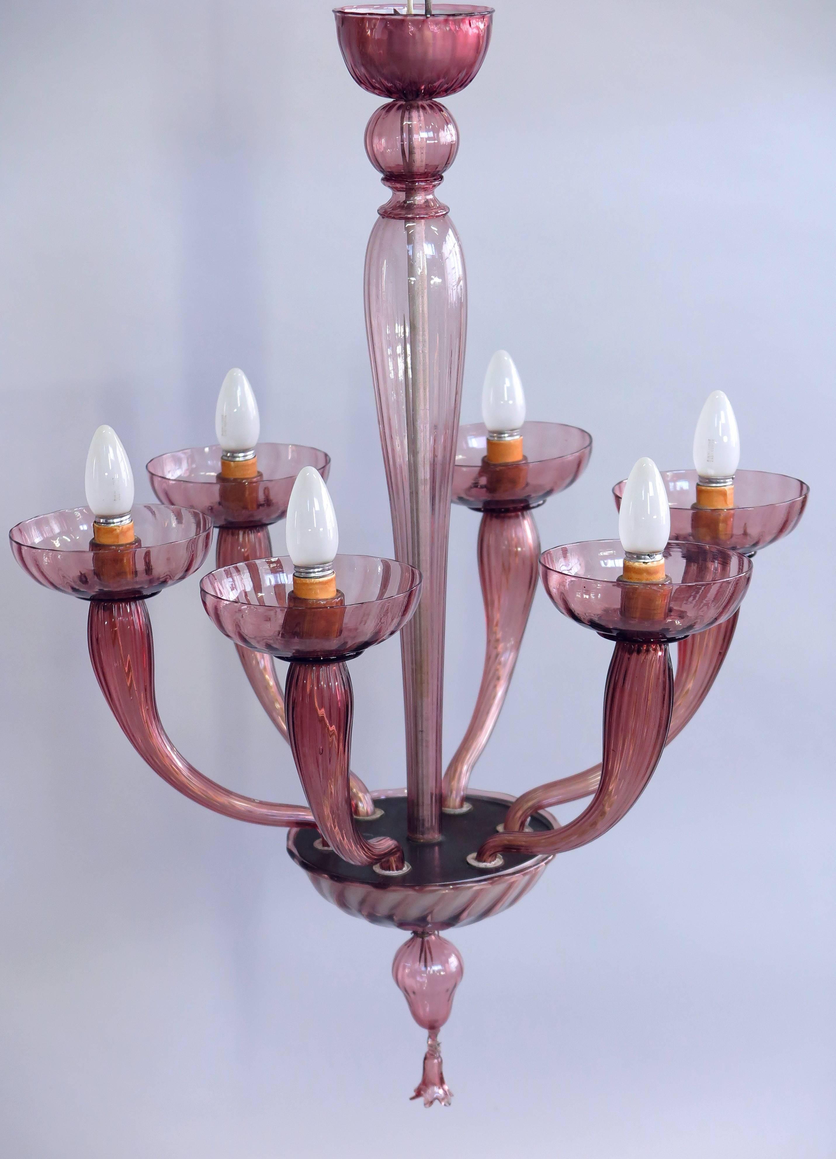 Attributed to Napoleone Martinuzzi, this six fixture chandelier was manufactured in 1930 by Venini, marked 