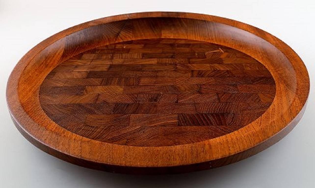 Jens Quistgaard, Danish design, large cutting board.

Measuring: 39.5 x 4 cm.

Good condition. Minor wear.

Marked.