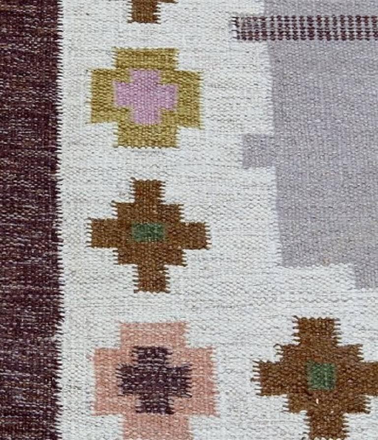 Röllakan, Swedish design 1960s, carpet.

Measures: 241 x 173 cm.

Monogram signed 